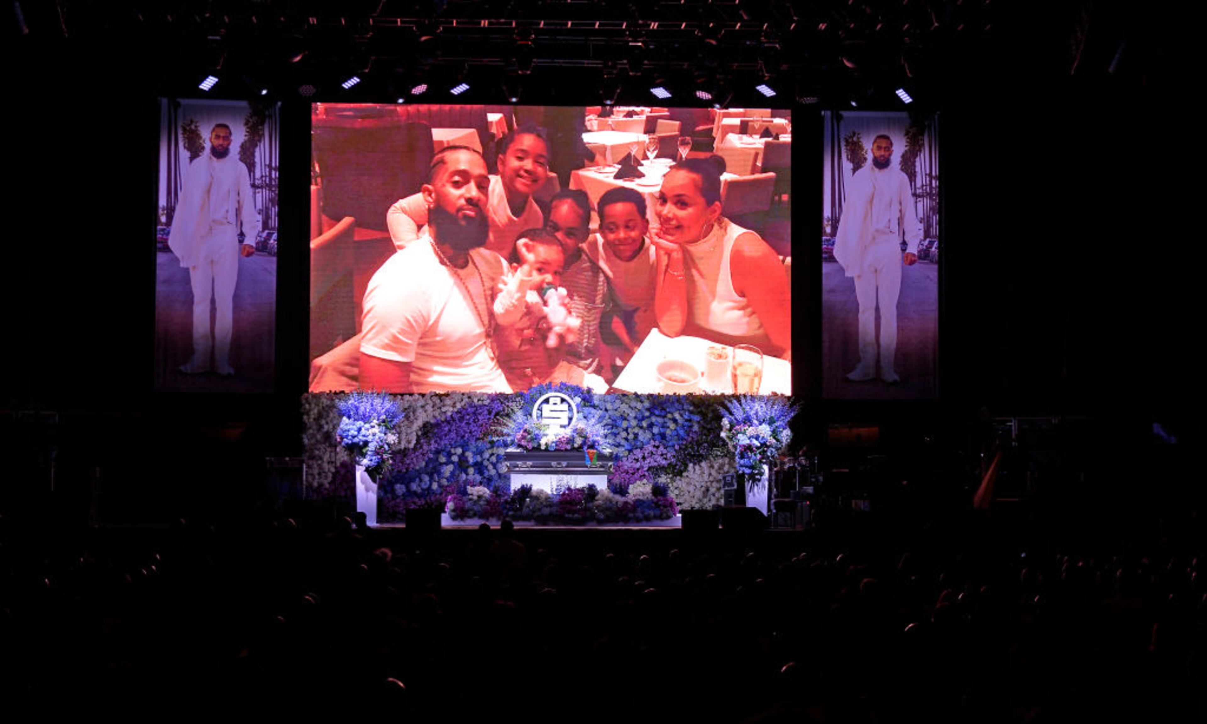 LOS ANGELES, CALIFORNIA - APRIL 11: (EDITORS NOTE: All images taken by Getty Images inside the Staples Center at Nipsey Hussle's Celebration of Life have been reviewed and approved for distribution by Atlantic Records) Photos are displayed during Nipsey Hussle's Celebration of Life at STAPLES Center on April 11, 2019 in Los Angeles, California. Nipsey Hussle was shot and killed in front of his store, The Marathon Clothing, on March 31, 2019 in Los Angeles. (Photo by Kevork Djansezian/Getty Images For Atlantic Records)