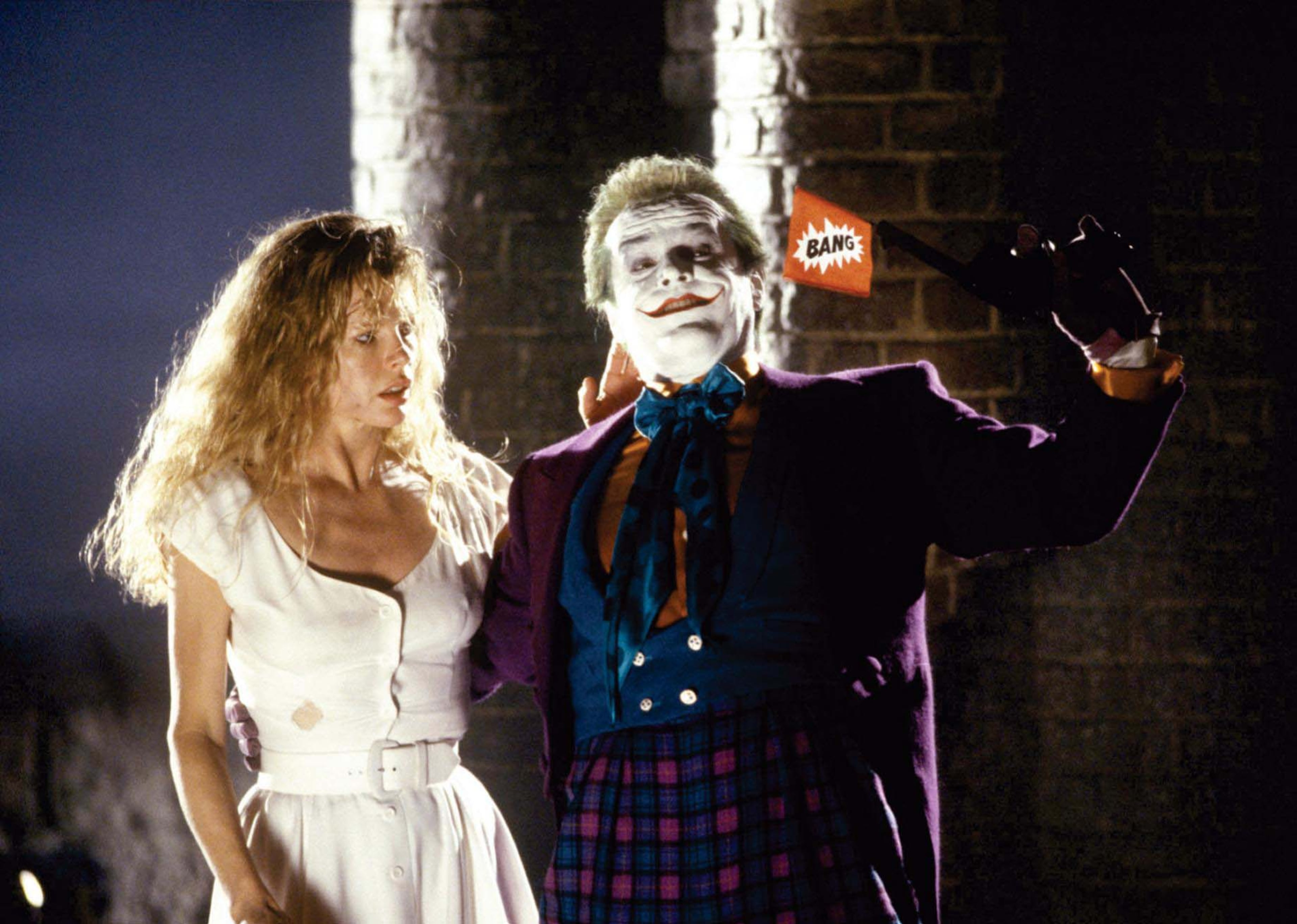 This undated film image released by Warner Bros. shows Kim Basinger, left, and Jack Nicholson as The Joker in a scene from "Batman" (1989).
