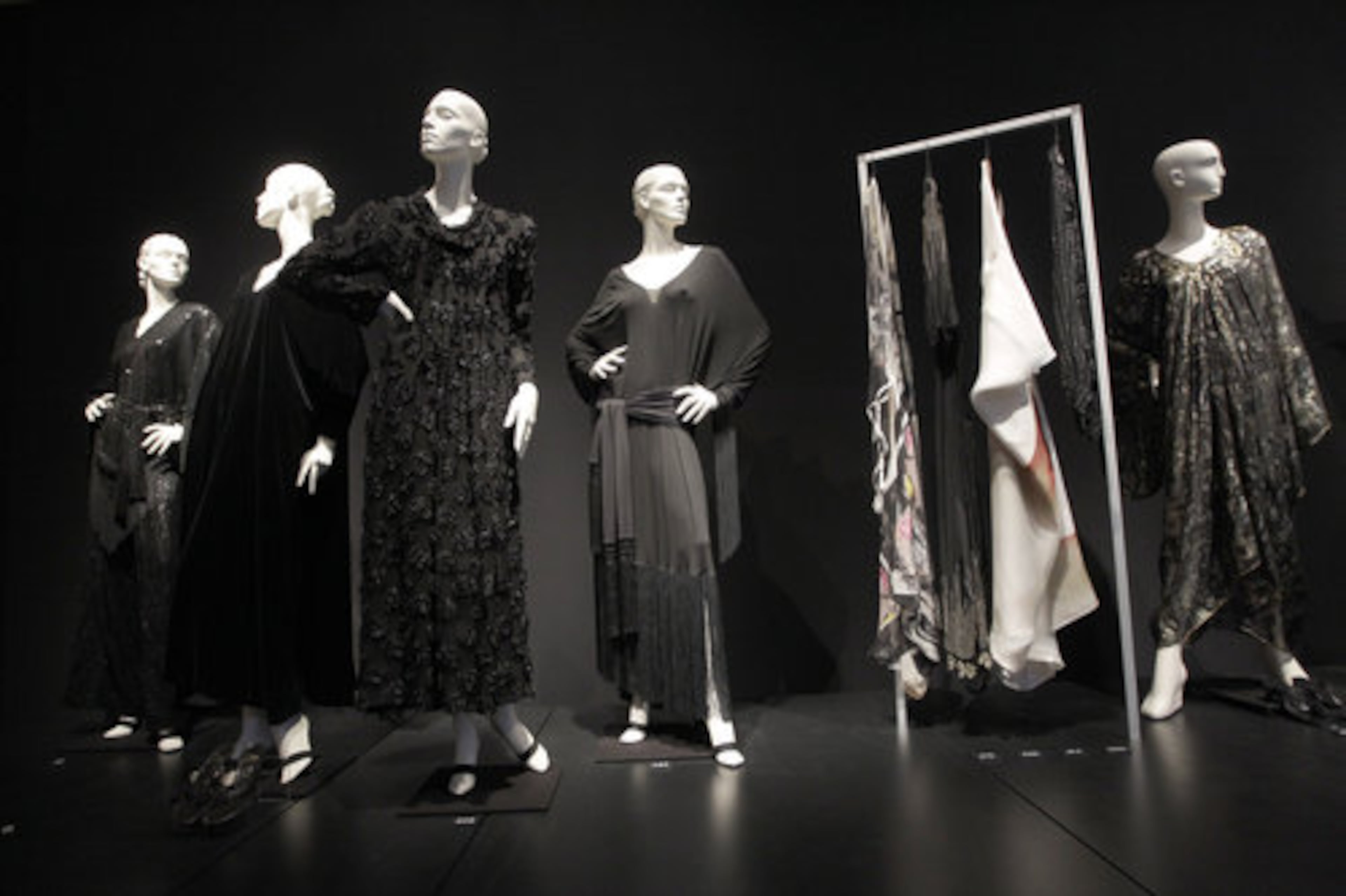 Dresses from the Collection of Elizabeth Taylor are on display.