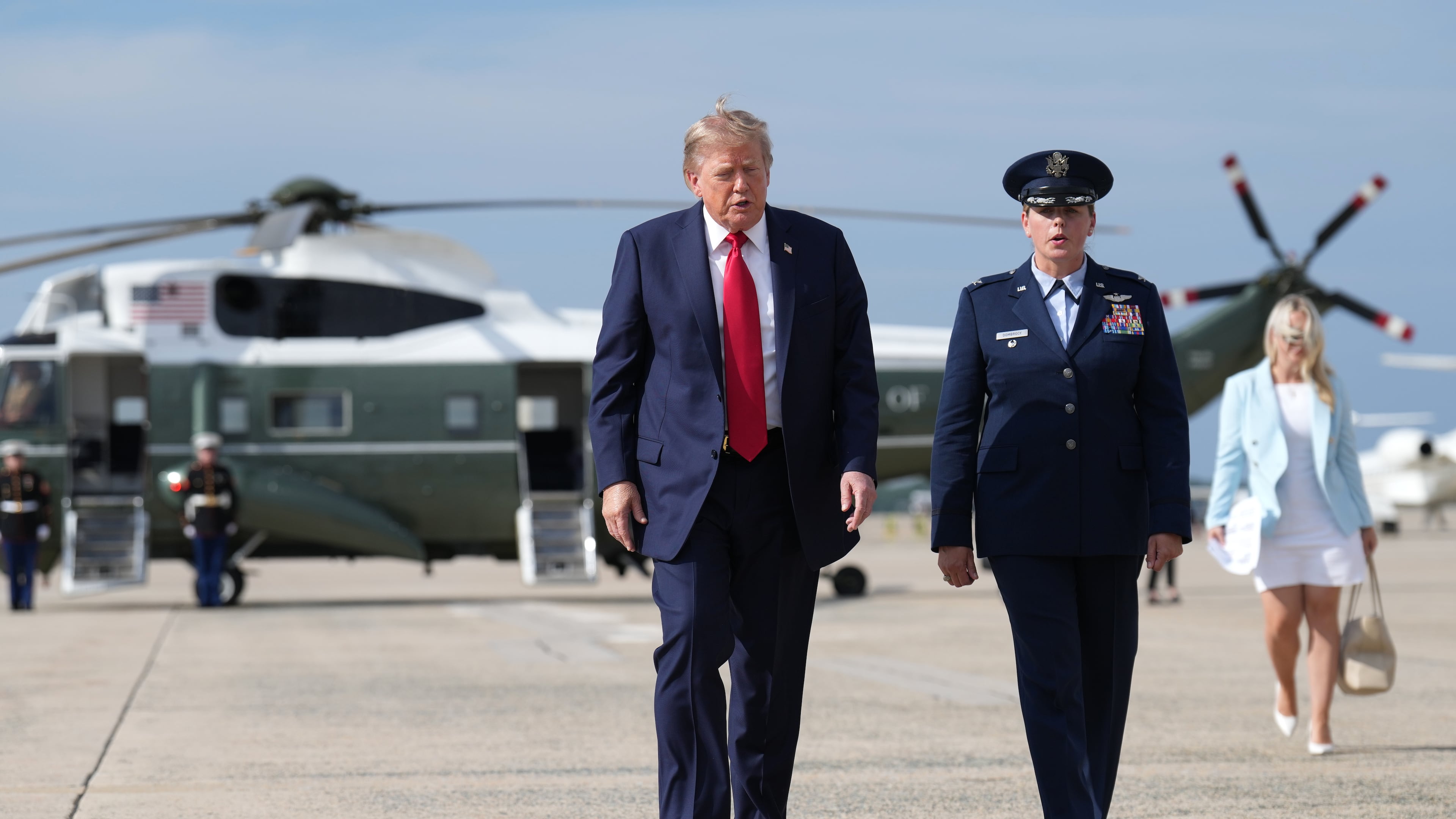 President Donald Trump, left, walks from Marine One to board Air Force One, Friday, Aug. 21, 2026, at Joint Base Andrews, Md., en route to South Carolina. (AP Photo/Jacquelyn Martin)