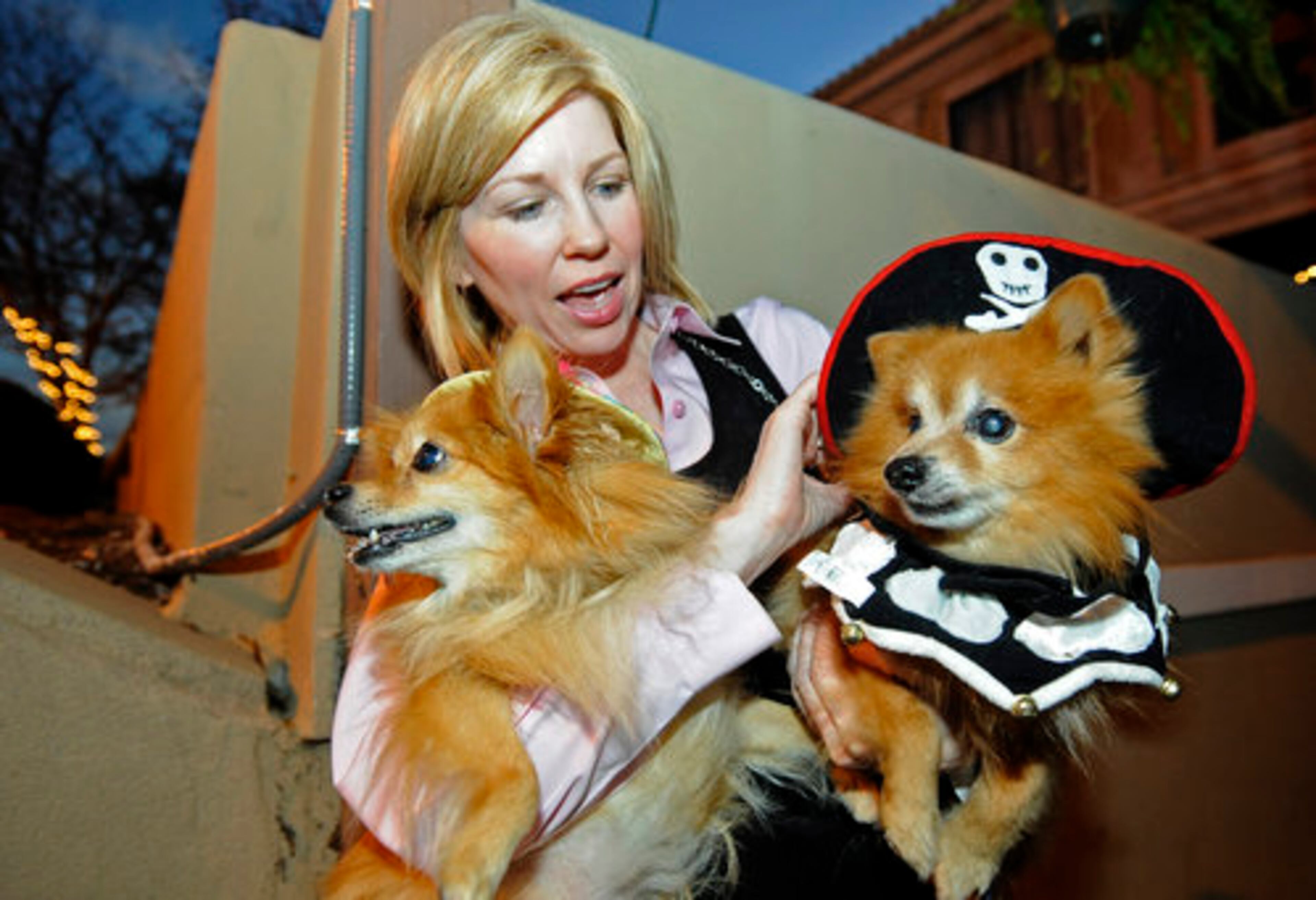 Joni Bellew brings her dogs Hattie (left) and Mickie to a casting call for 'It's Me or the Dog' reality show.