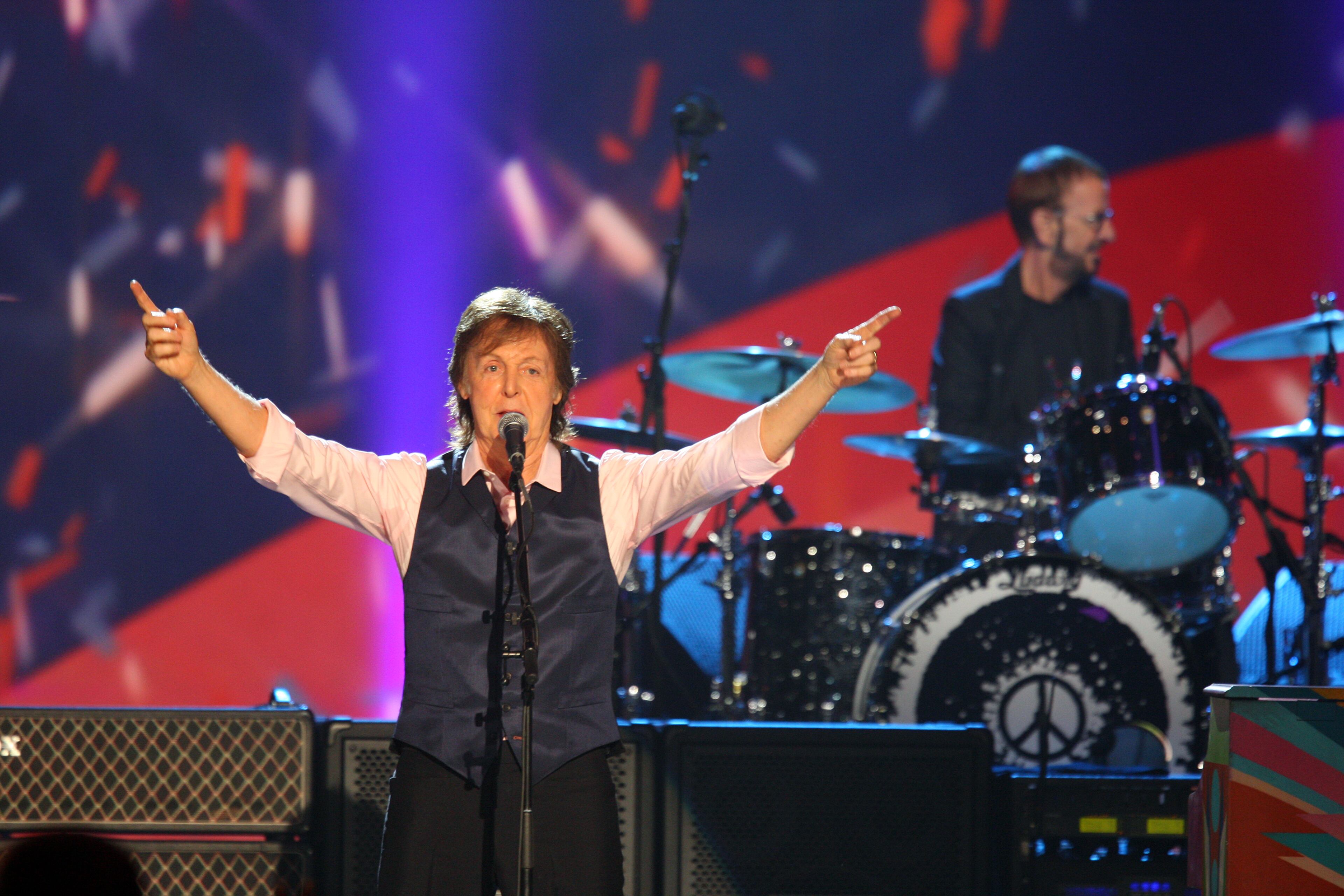 Paul McCartney and Ringo Starr perform at The Night that Changed America: A Grammy Salute to the Beatles, on Monday, Jan. 27, 2014, in Los Angeles. (Photo by Zach Cordner/Invision/AP)