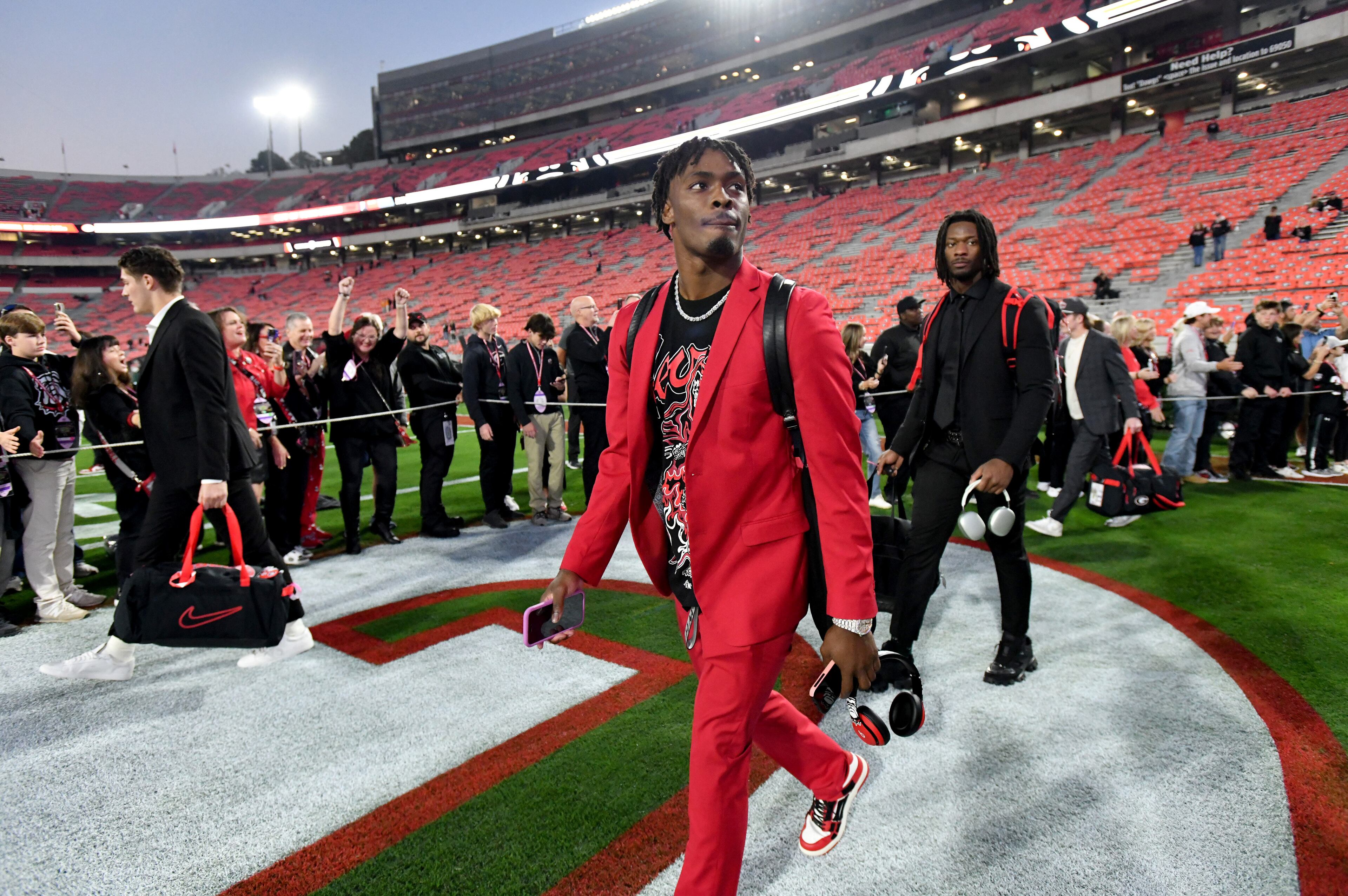 Georgia defensive back Malaki Starks enters with teammates and coaching staff during Dawgs Walk before an NCAA football game between Georgia and Tennessee at Sanford Stadium, Saturday, November 16, 2024, in Athens. (Hyosub Shin / AJC)