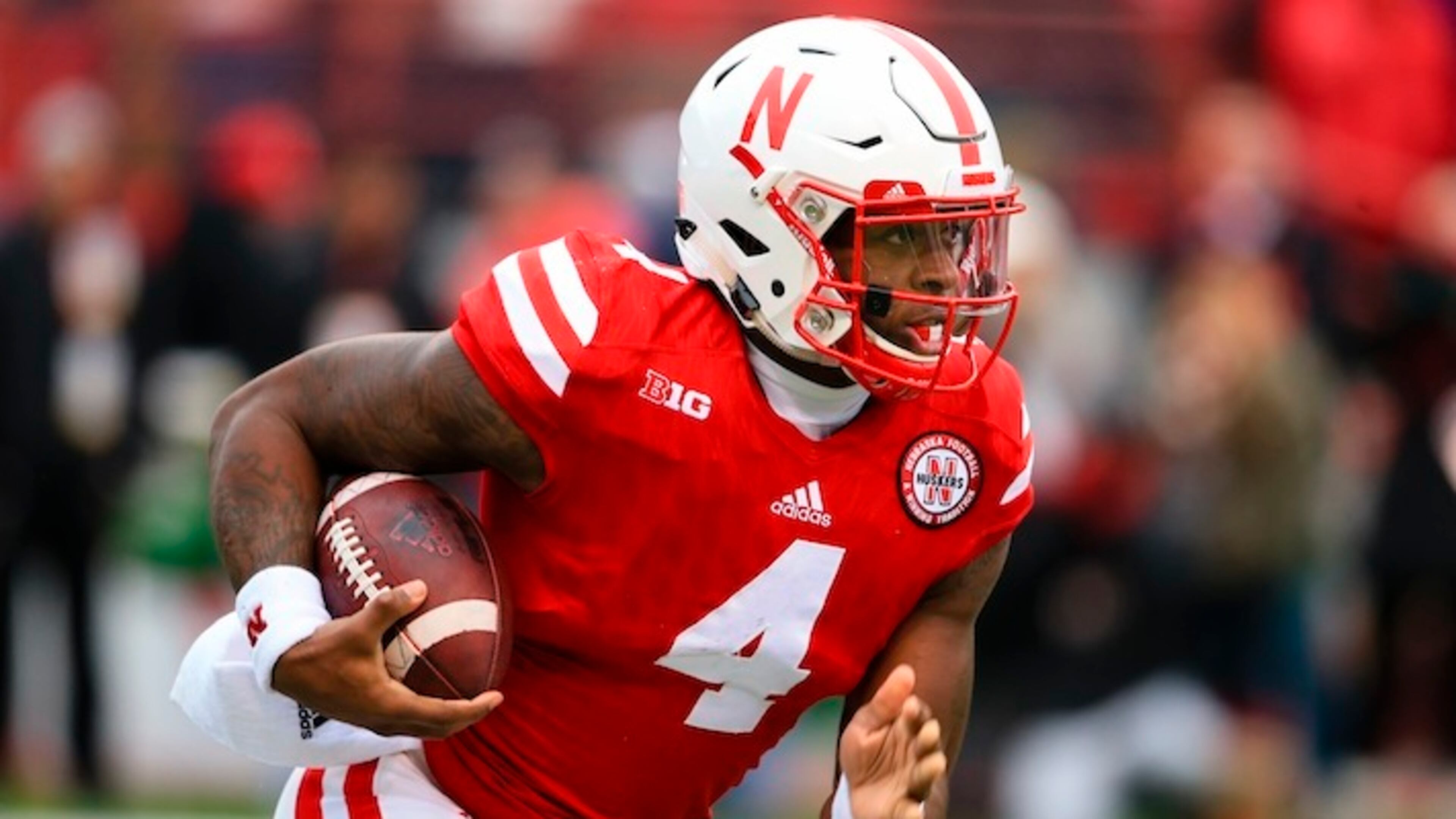 Nebraska quarterback Tommy Armstrong Jr. (4) carries the ball during the first half of an NCAA college football game against Iowa in Lincoln, Neb., Friday, Nov. 27, 2015. (AP Photo/Nati Harnik)