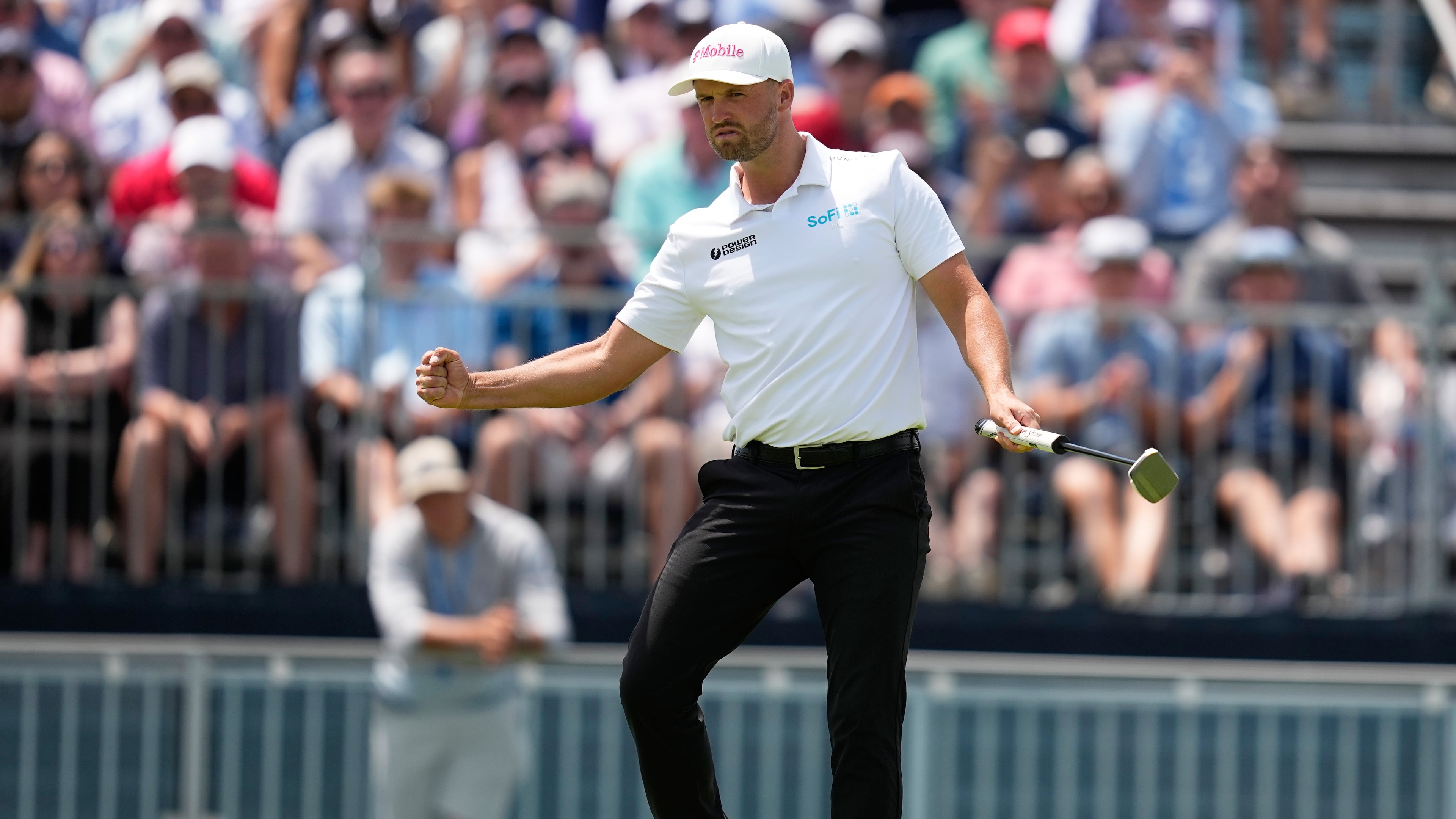 Wyndham Clark celebrates after a birdie on the 12th hole during the second round of the U.S. Open golf tournament at Shinnecock Hills Golf Club in Southampton, N.Y., Friday, June 19, 2026.(AP Photo/David J. Phillip)