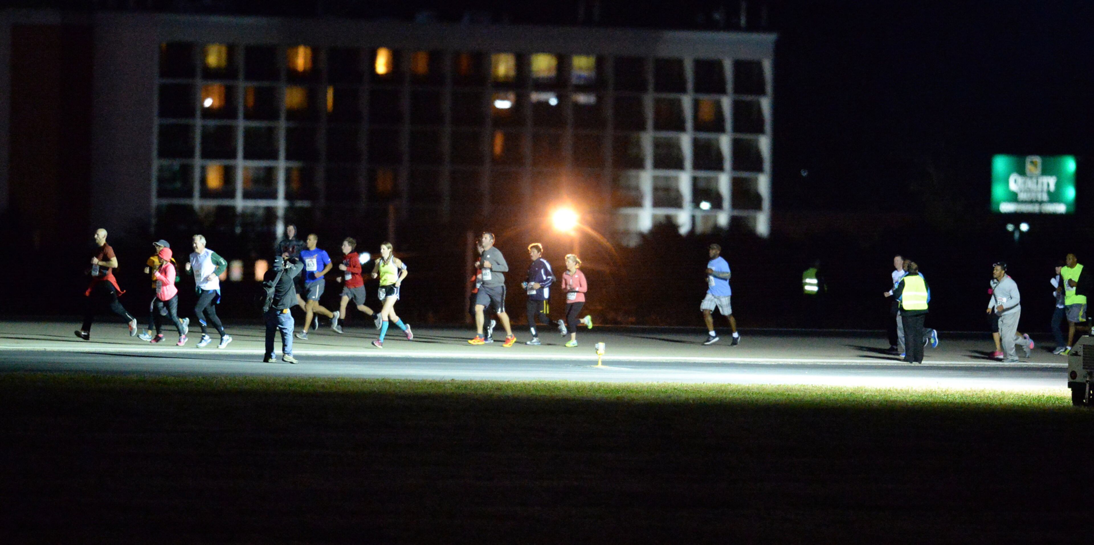 OCTOBER 17, 2015 ATLANTA Runners head for the finish line along the 5th runway. Mayor Kasim Reed and United Way President Milton Little joined more than 2,000 runners at the Mayor’s Inaugural 5K on the 5th Runway at the world’s busiest airport Saturday, October 17, 2015. Airport officials shut down the 5th runway (Runway 10/28) until 8:15 am so runners and walkers could exit the course. All proceeds from the event will benefit United Way of Greater Atlanta. Major sponsors of The Mayor’s Inaugural 5K on the 5th Runway include Delta Air Lines, The Coca-Cola Company, Enterprise Rental Car, Georgia International Convention Center, MARTA, and Publix. Over $123,000 was raised, said airport spokesman Reese McCranie. The race's overall winner was Andrew Murfee, 15, a Woodward Academy student. KENT D. JOHNSON/KDJOHNSON@AJC.COM