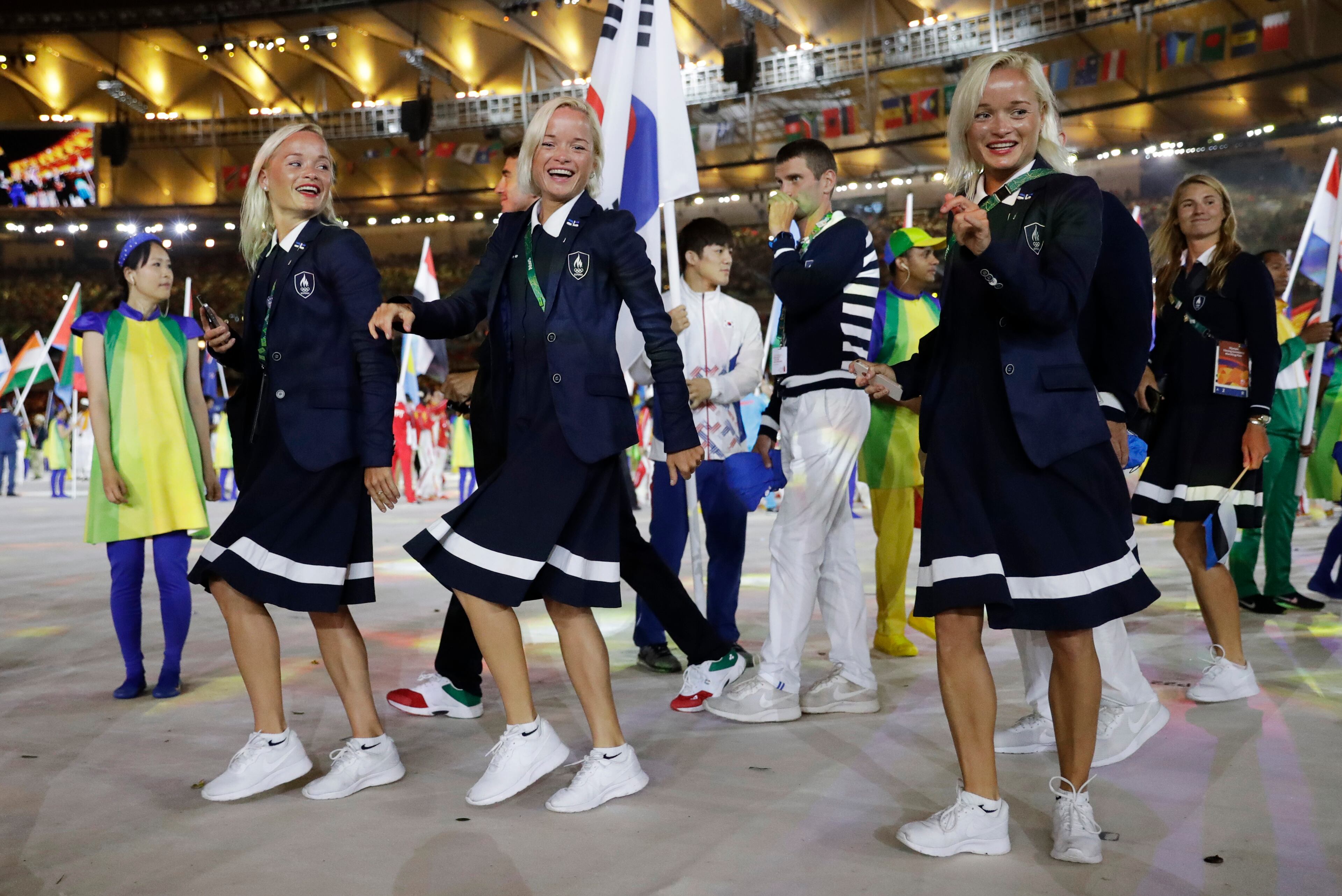 Triplets Liina, Lily and Leila Luik from Estonia arrive during the closing ceremony in the Maracana stadium at the 2016 Summer Olympics in Rio de Janeiro, Brazil, Sunday, Aug. 21, 2016. (AP Photo/Matt Dunham)