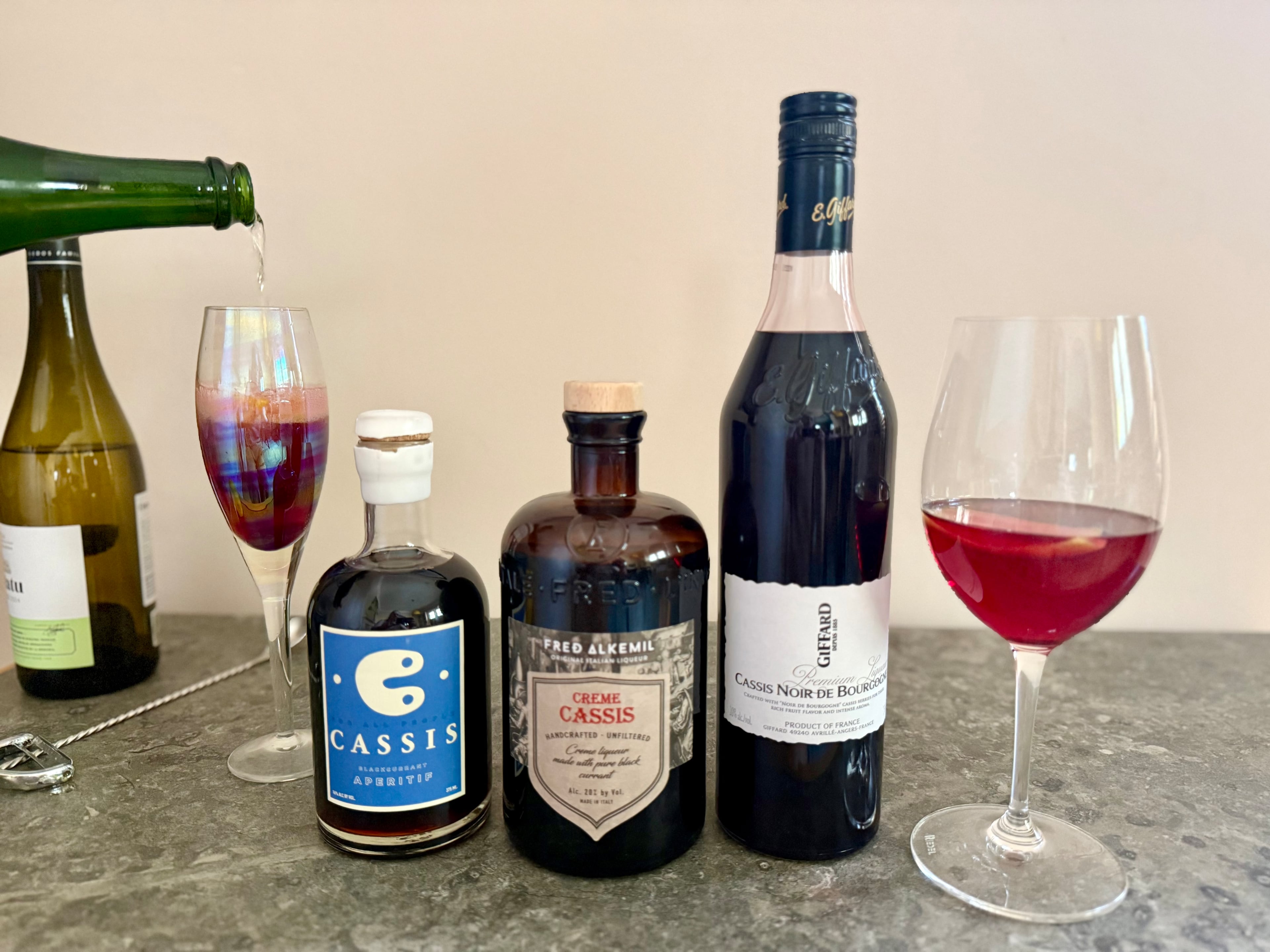 The Kir royale (far left) substitutes white wine for Champagne. (Jerry & Krista Slater for the AJC)