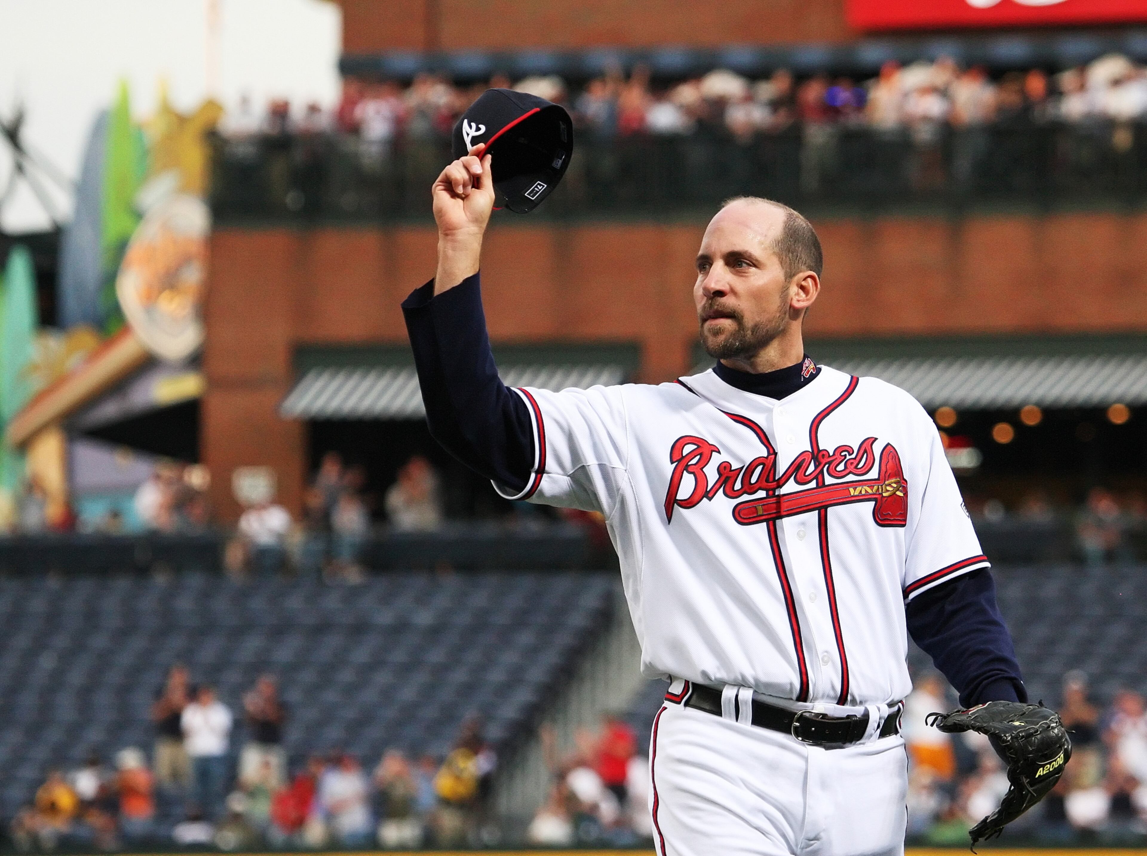 080422 ATLANTA: Atlanta Braves starting pitcher John Smoltz reacts after throwing his 3,000th career strikeout in the third inning becoming only the 16th pitcher in Major League history to reach the mark. Twenty years ago Smoltz threw out Darryl Strawberry on strikes to then catcher Bruce Benedict. Tuesday, April 22, 2008. Pouya Dianat / AJC