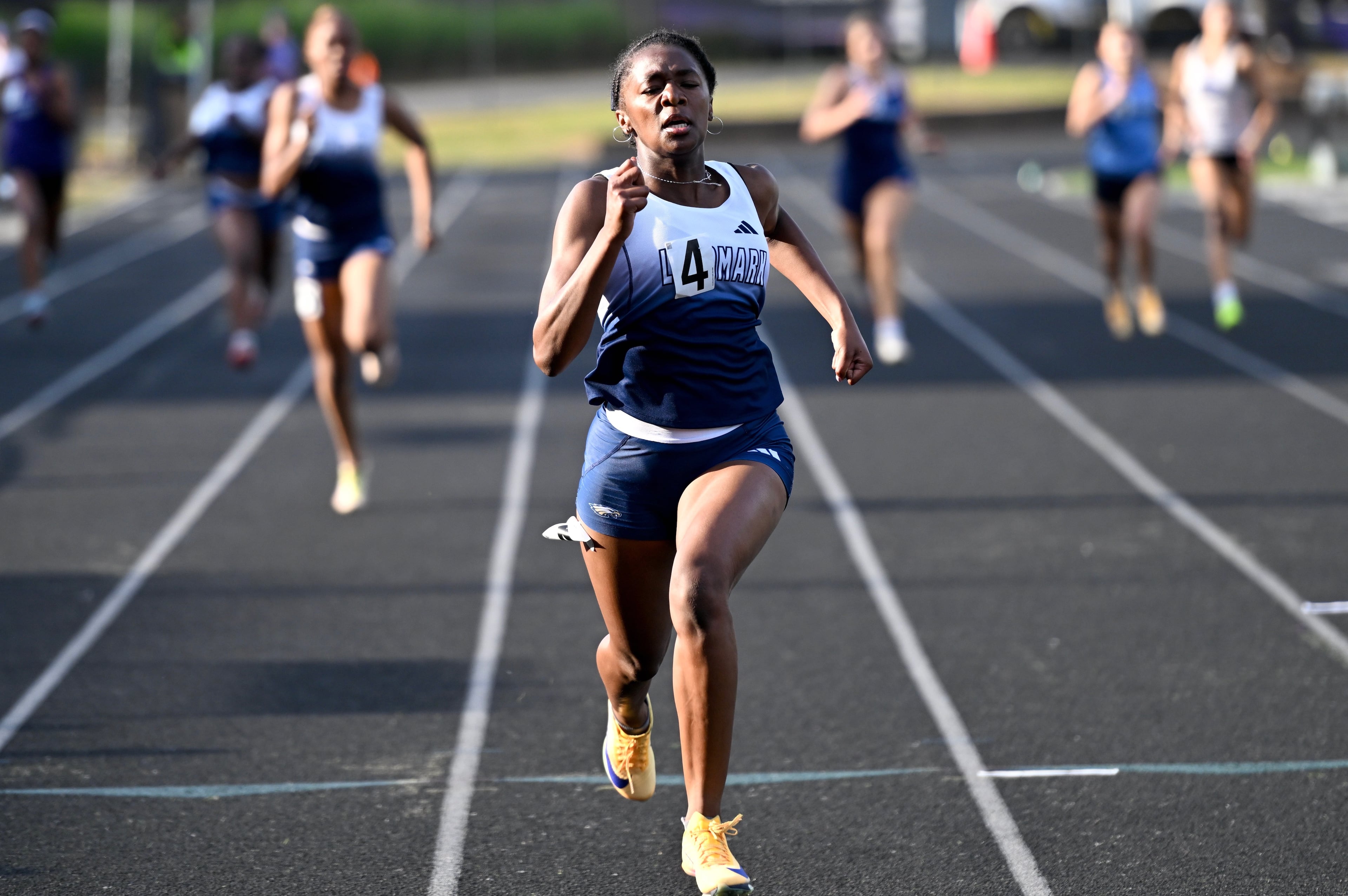 Melanie Doggett running at track meet
