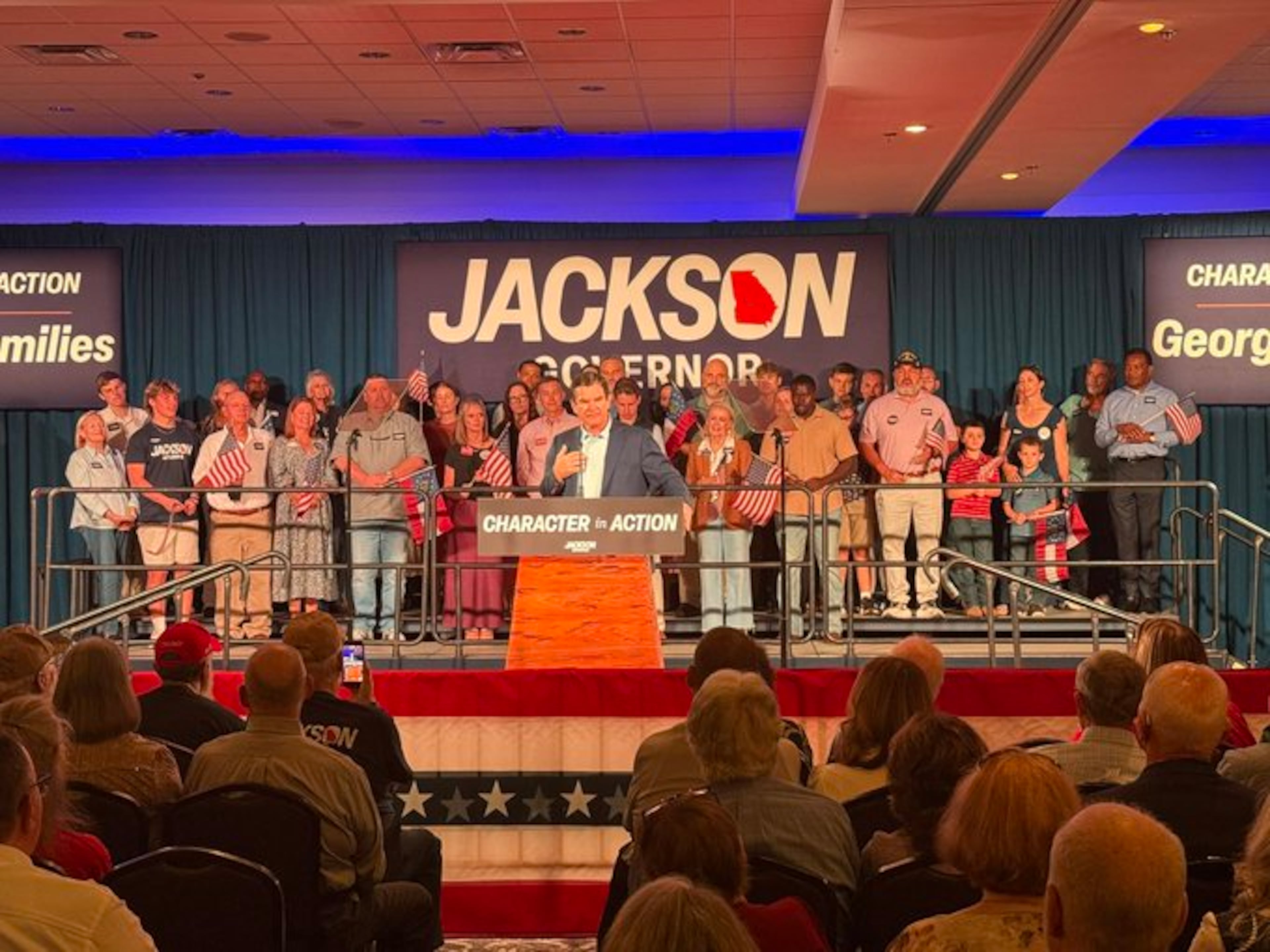 U.S. Rep. Austin Scott speaks at a rally supporting Republican nominee for governor RIck Jackson in Forsyth on Monday. (Greg Bluestein/AJC)