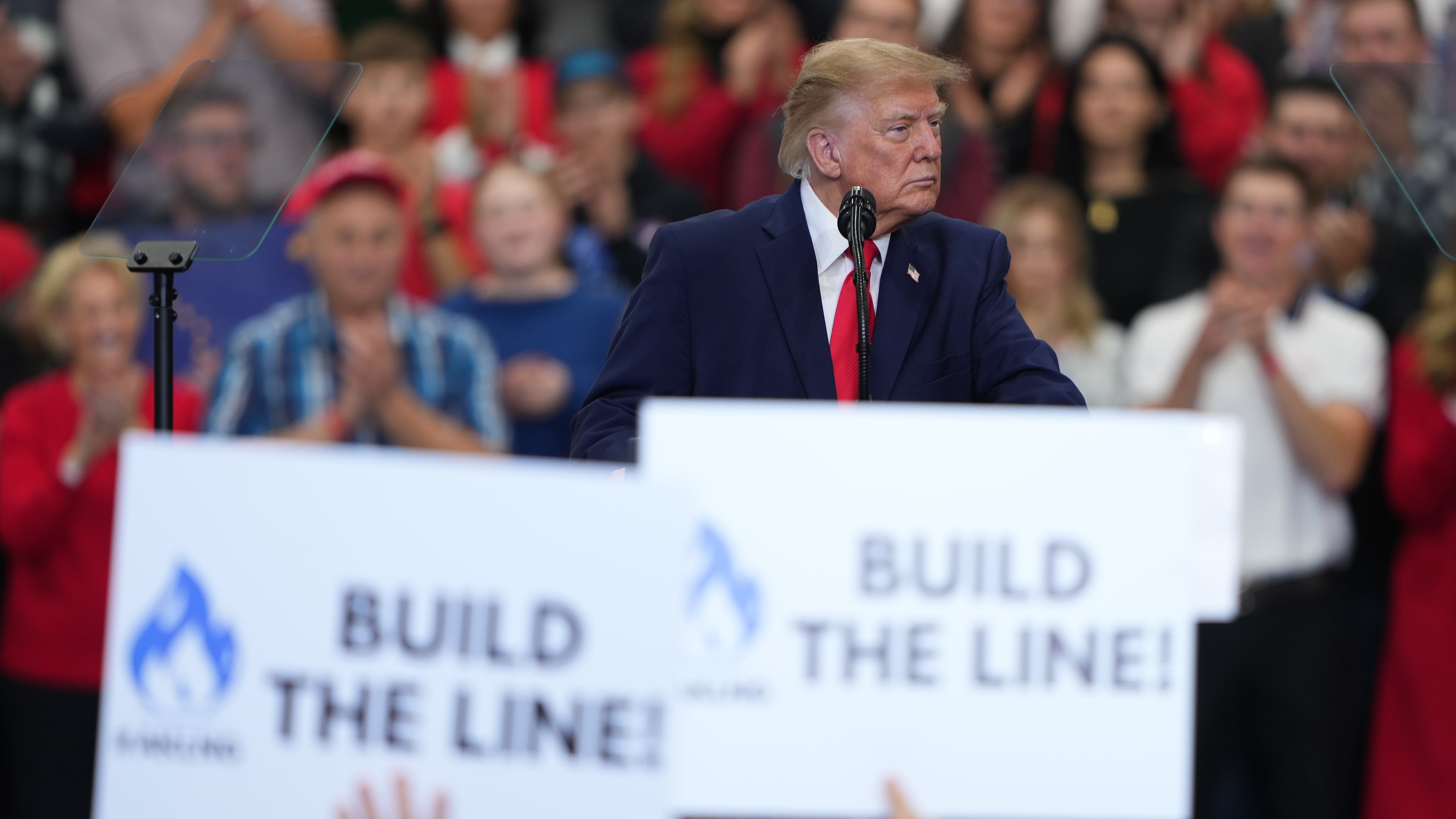 President Donald Trump speaks about the proposed Alaska LNG project at a campaign rally at the Curtis D. Menard Memorial Sports Center, Tuesday, Oct. 13, 2026, in Wasilla, Alaska. (AP Photo/Lindsey Wasson)