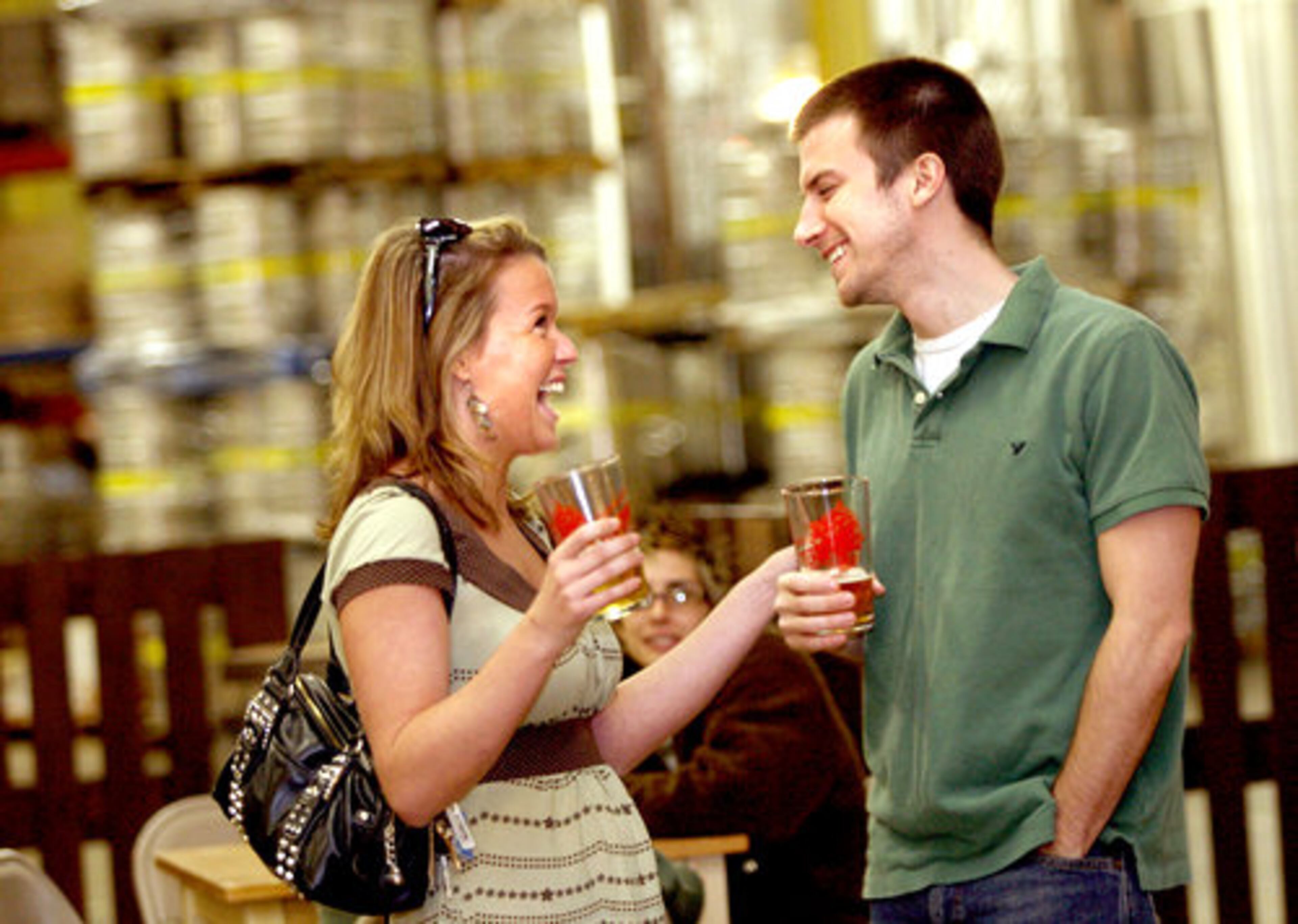 After taking the tour, Jana Ritter (left) and Wes Jacobs enjoy the Terrapin tasting.