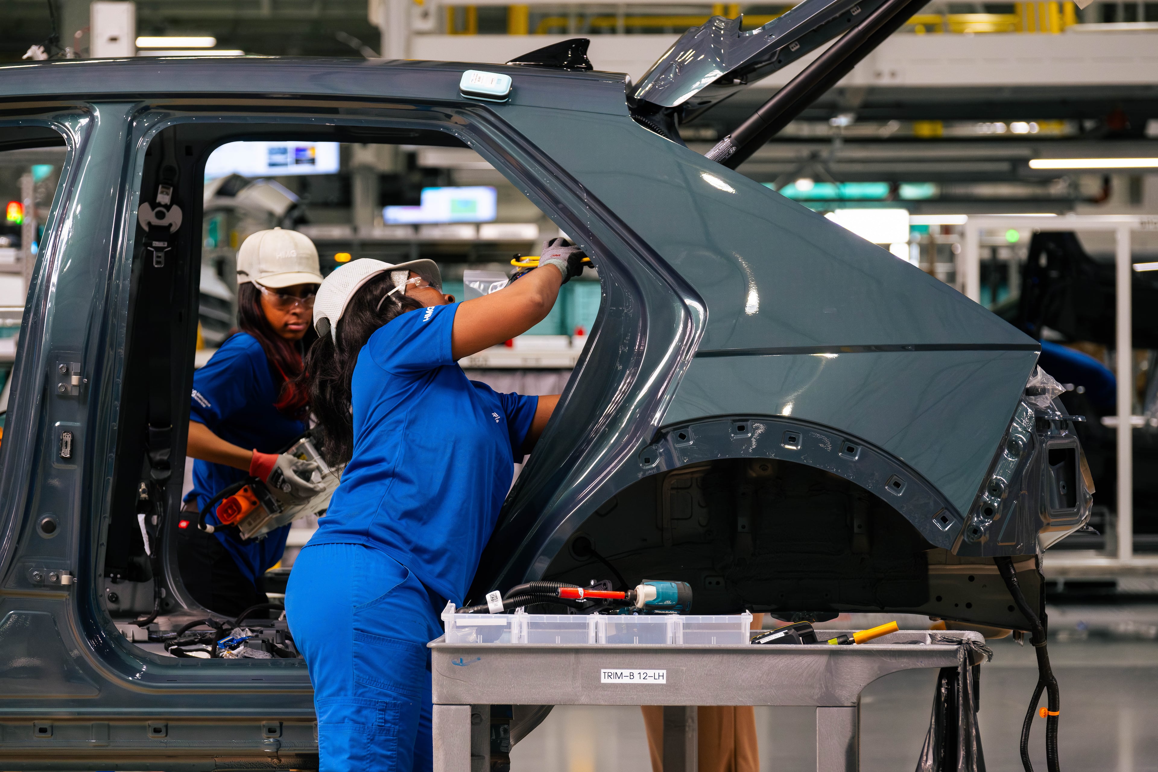 Metapros assemble parts on the IONIQ 5 electric car at the Hyundai Metaplant in Bryan County, GA on March 26, 2025. (Justin Taylor/The Current GA)