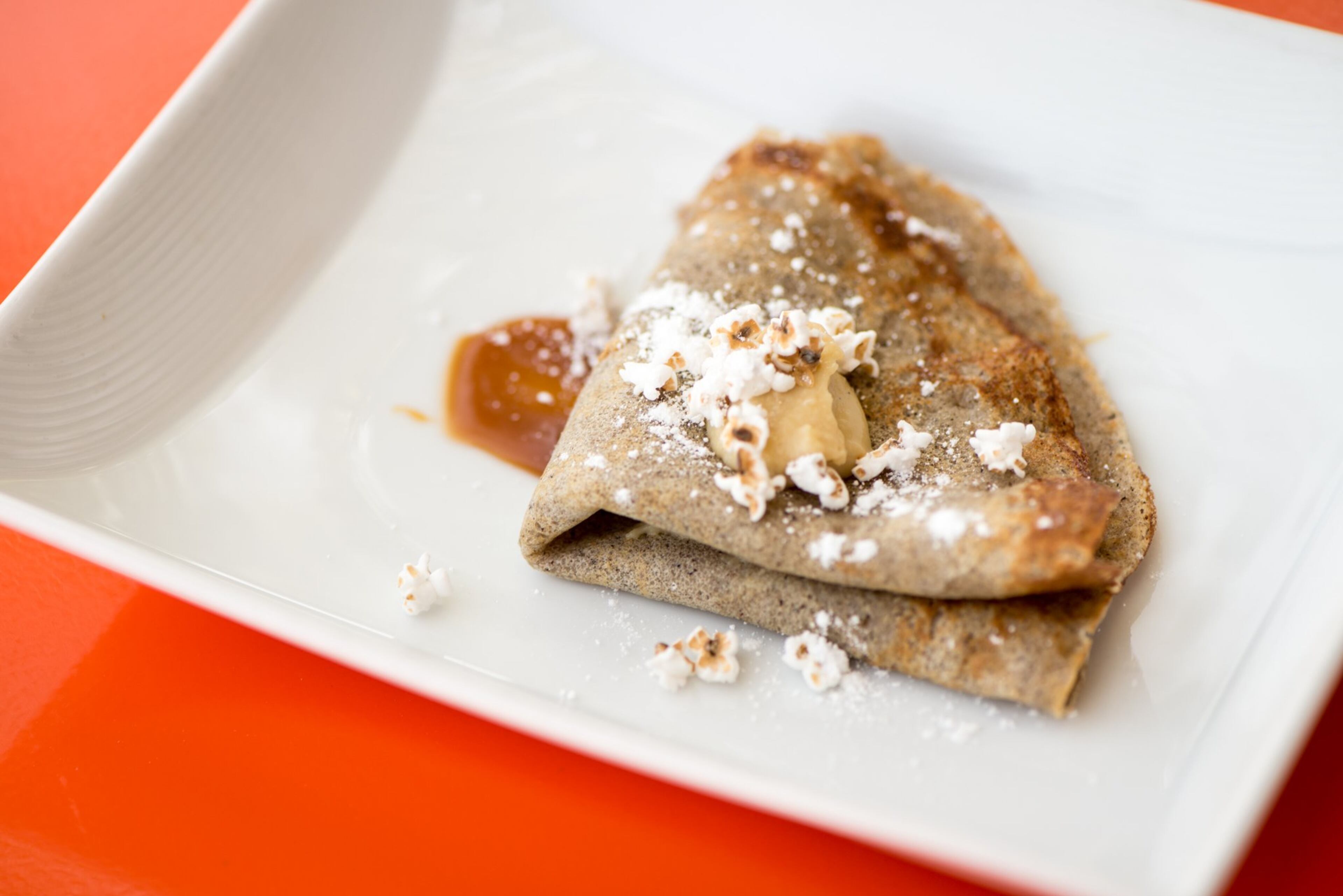 Crepes with caramel and popped sorghum