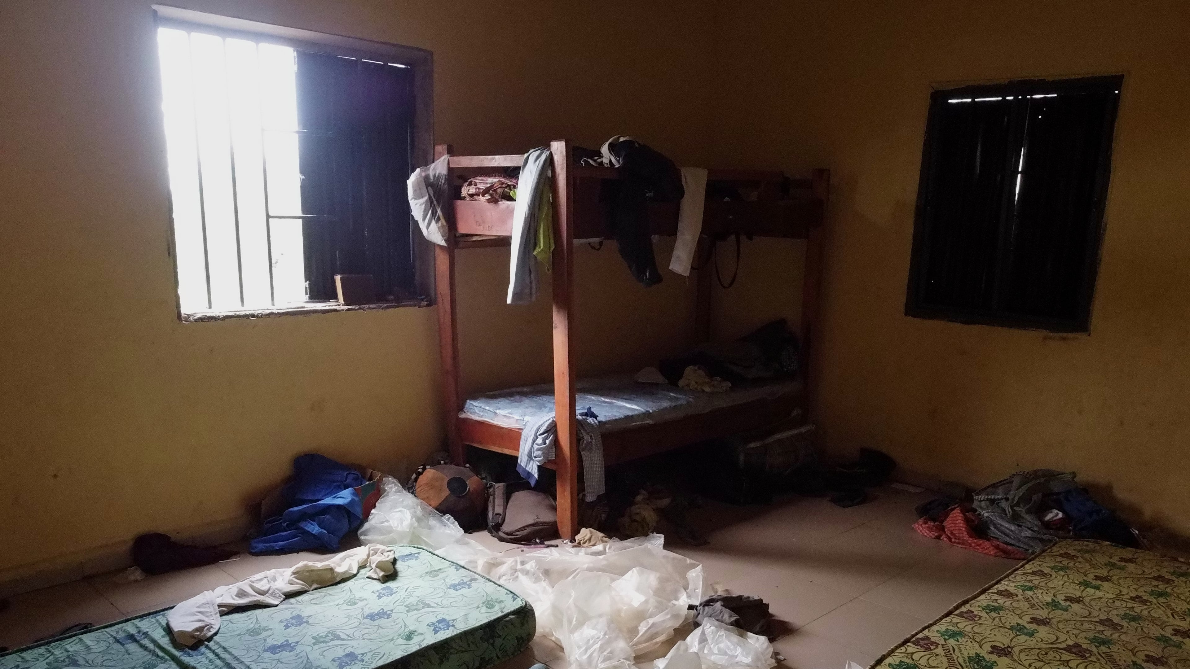 Students' belongings are seen inside a dormitory of an orphanage that was raided by gunmen late Sunday, in Lokoja, Nigeria, Monday, April 27, 2026. (AP Photo/Haruna Yahaya)
