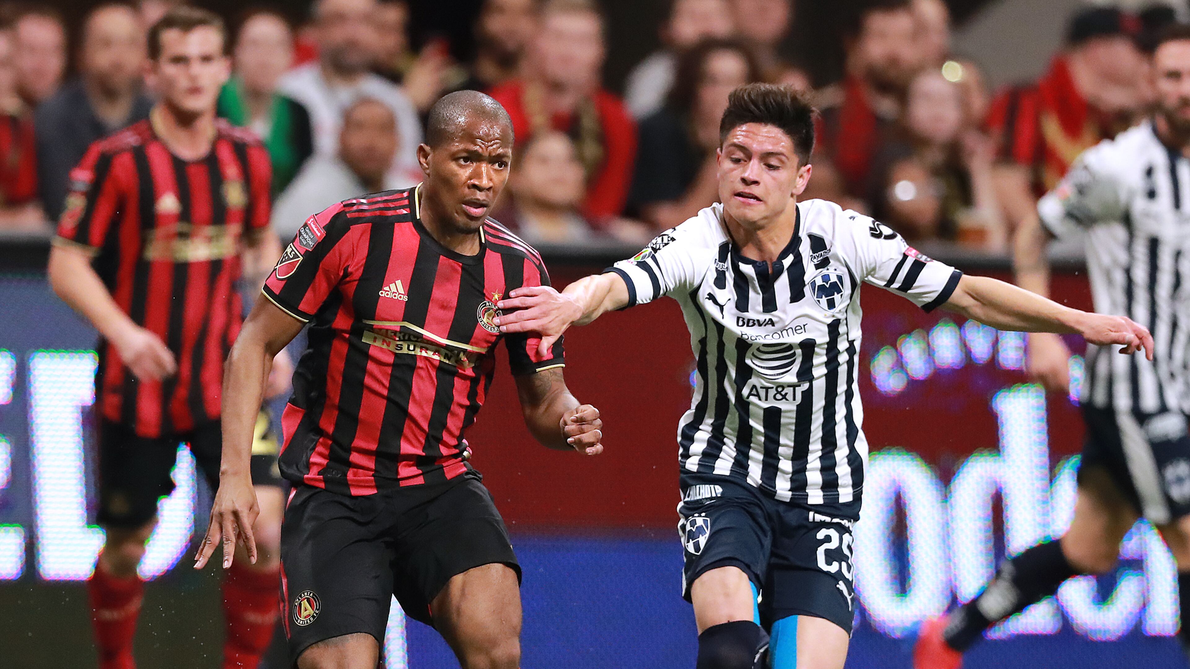 Atlanta United midfielder Darlington Nagbe, the man on the match, works the ball against Monterrey defender Jonathan Gonzalez in a Concacaf Champions league quarterfinal match on Wednesday, March 13, 2019, in Atlanta. Curtis Compton/ccompton@ajc.com