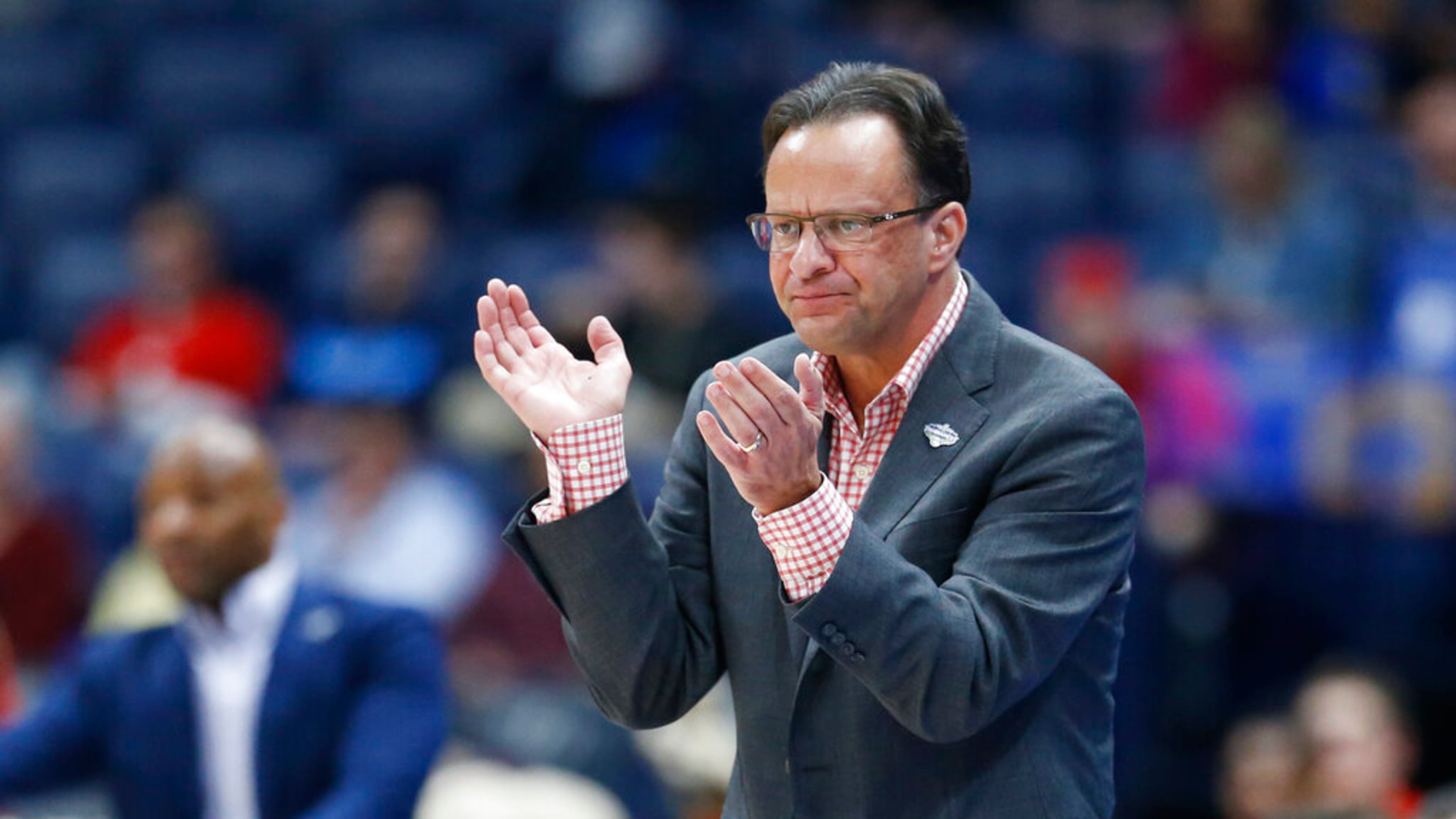 Georgia head coach Tom Crean watches the action in the first half of an NCAA college basketball game against Mississippi in the Southeastern Conference Tournament Wednesday, March 11, 2020, in Nashville, Tenn. (AP Photo/Mark Humphrey)