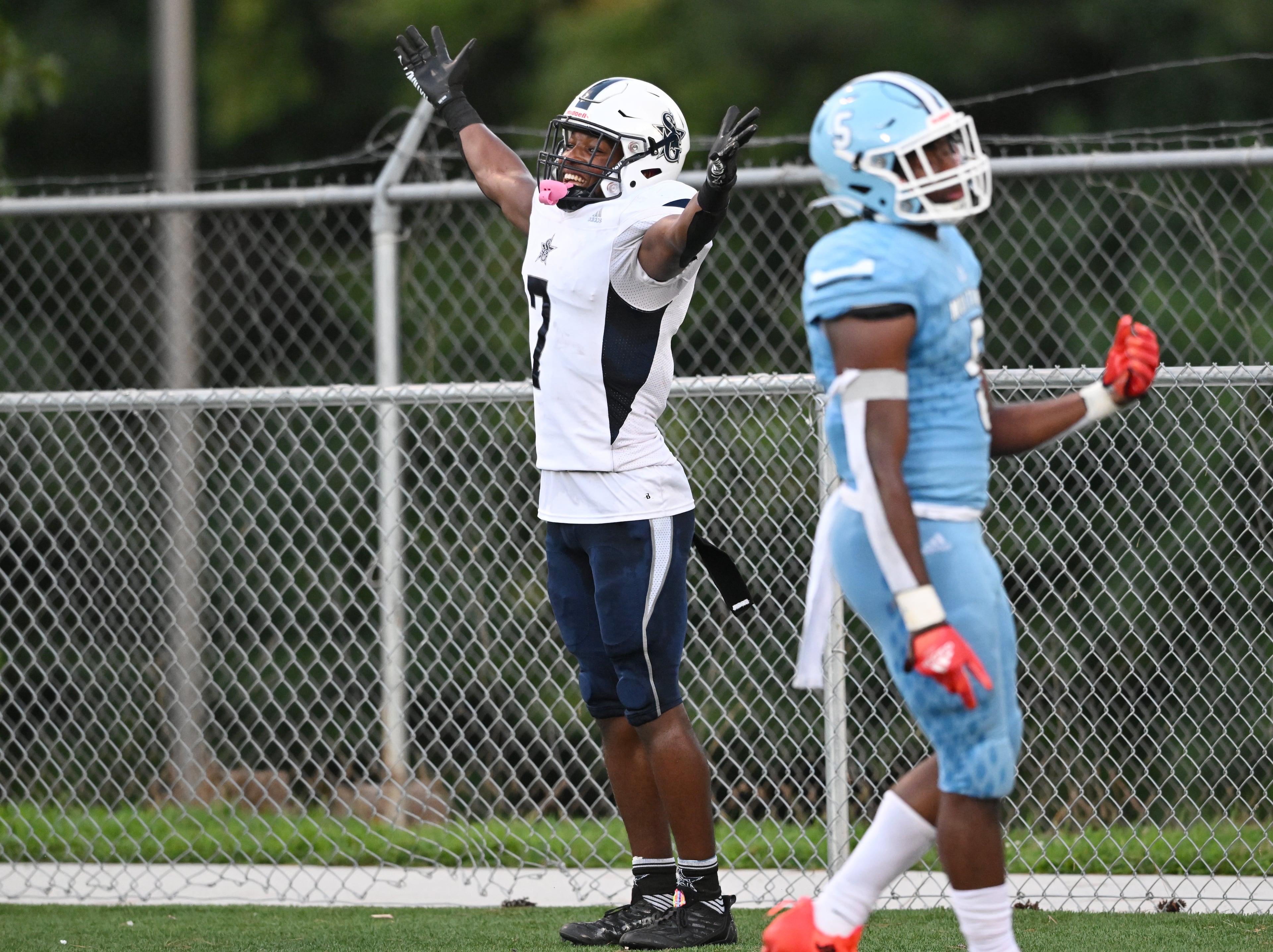 South Gwinnett's Devin Thomas (7) celebrates after scoring a touchdown during the first half at Meadowcreek High School in Norcross on Friday, August 26, 2022. (Hyosub Shin / Hyosub.Shin@ajc.com)