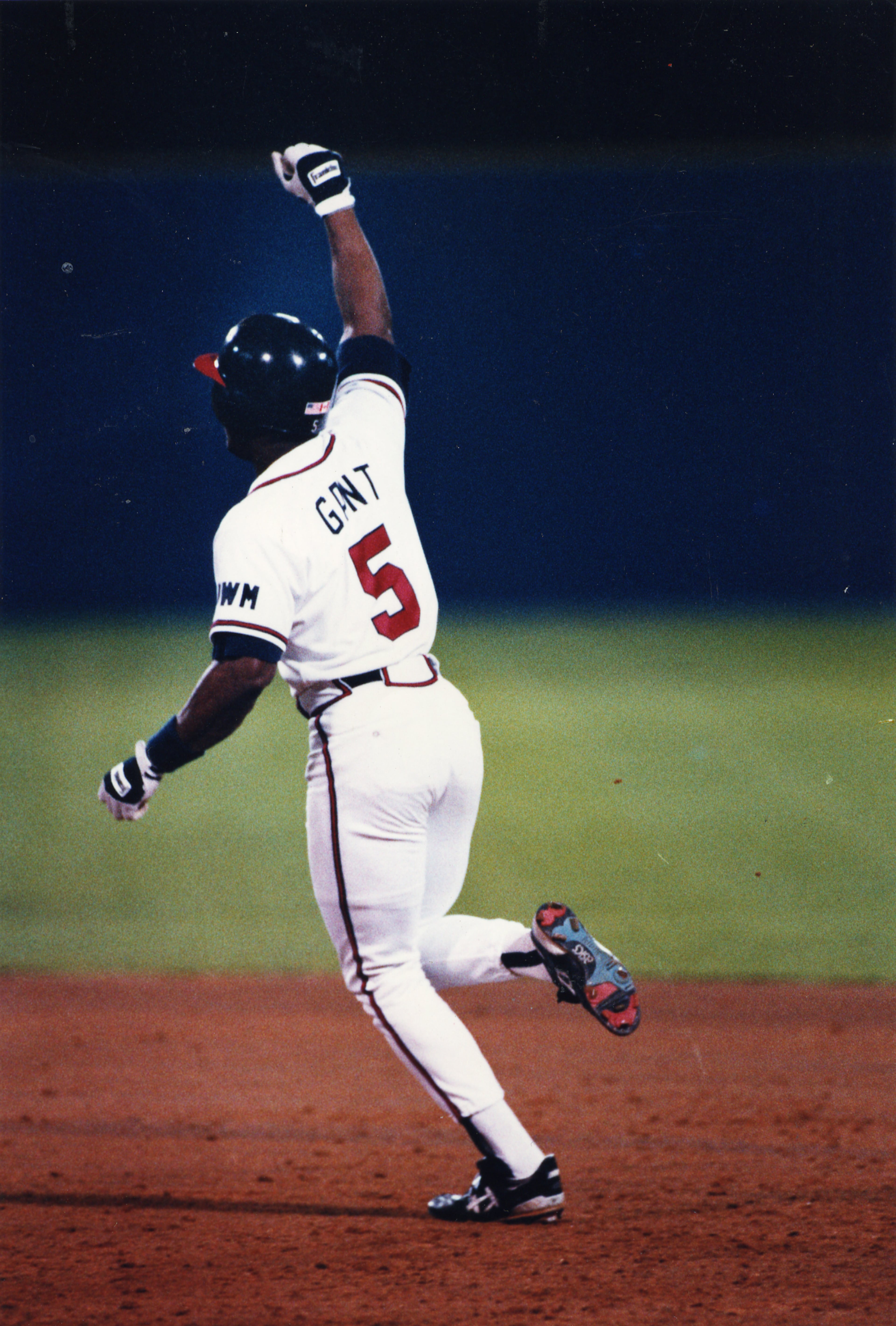 Ron Gant raises his fist after he hit a three-run homer in the ninth inning to beat the San Diego Padres 4-1 in 1991. (Frank Niemeir / AJC staff)