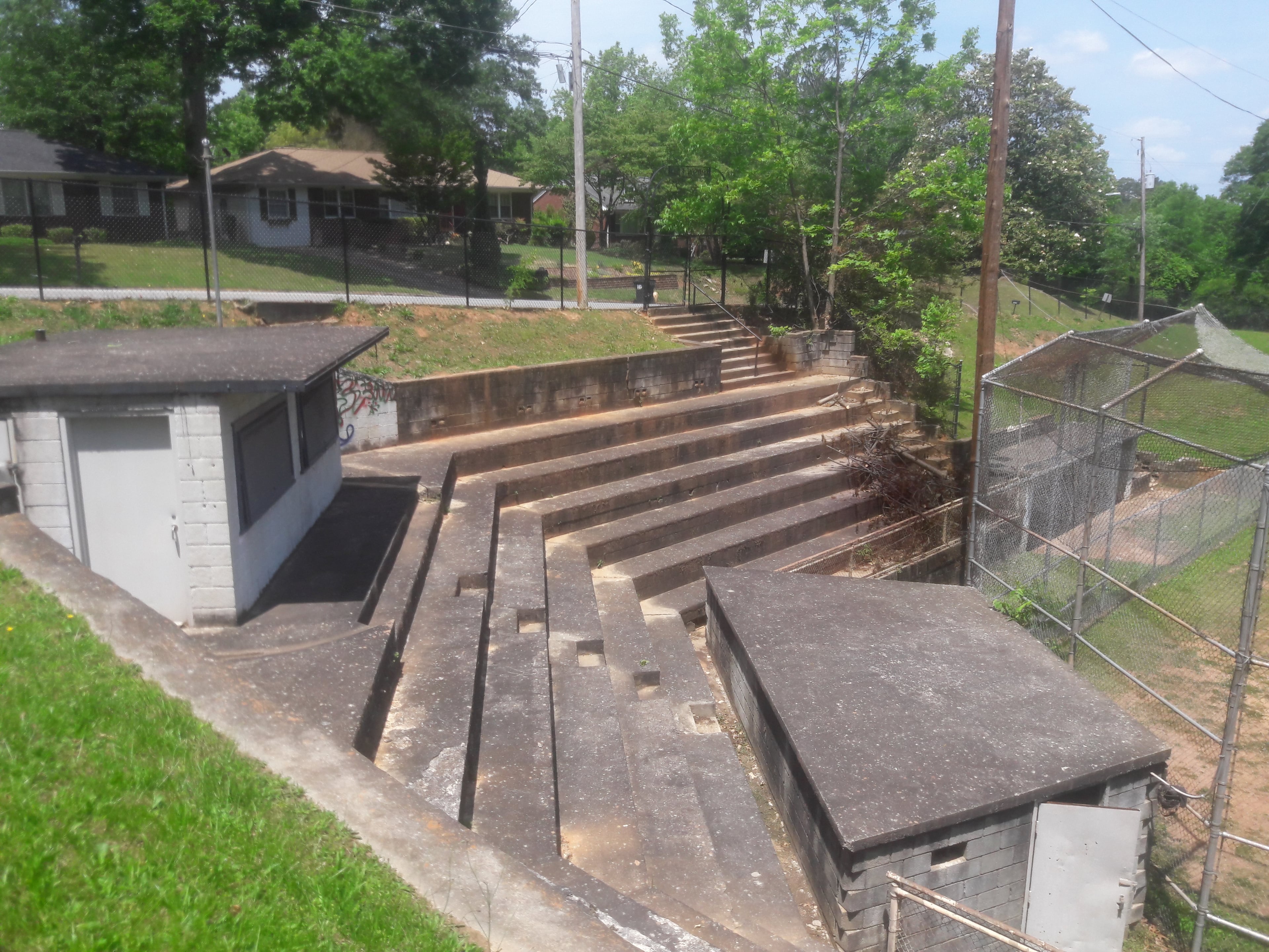 East Point sought to use CDBG funds to fix up the 1950s-era ballfield, but found federal historic preservation rules forbade that. They wanted to replace the coaches' box, seen at left; the concrete bleachers; and the cinder-block dugout at lower right.