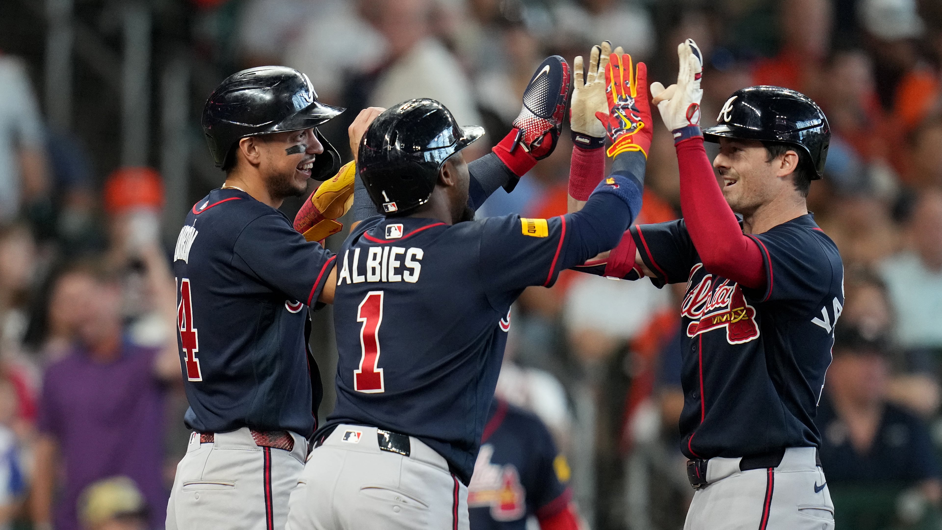 Atlanta Braves' Mike Yastrzemski (right) celebrates after his three-run home run with Mauricio Dubon (left) and Ozzie Albies (center) during the sixth inning of a baseball game against the Houston Astros, Sunday, Sept. 20, 2026, in Houston. (Karen Warren/AP)