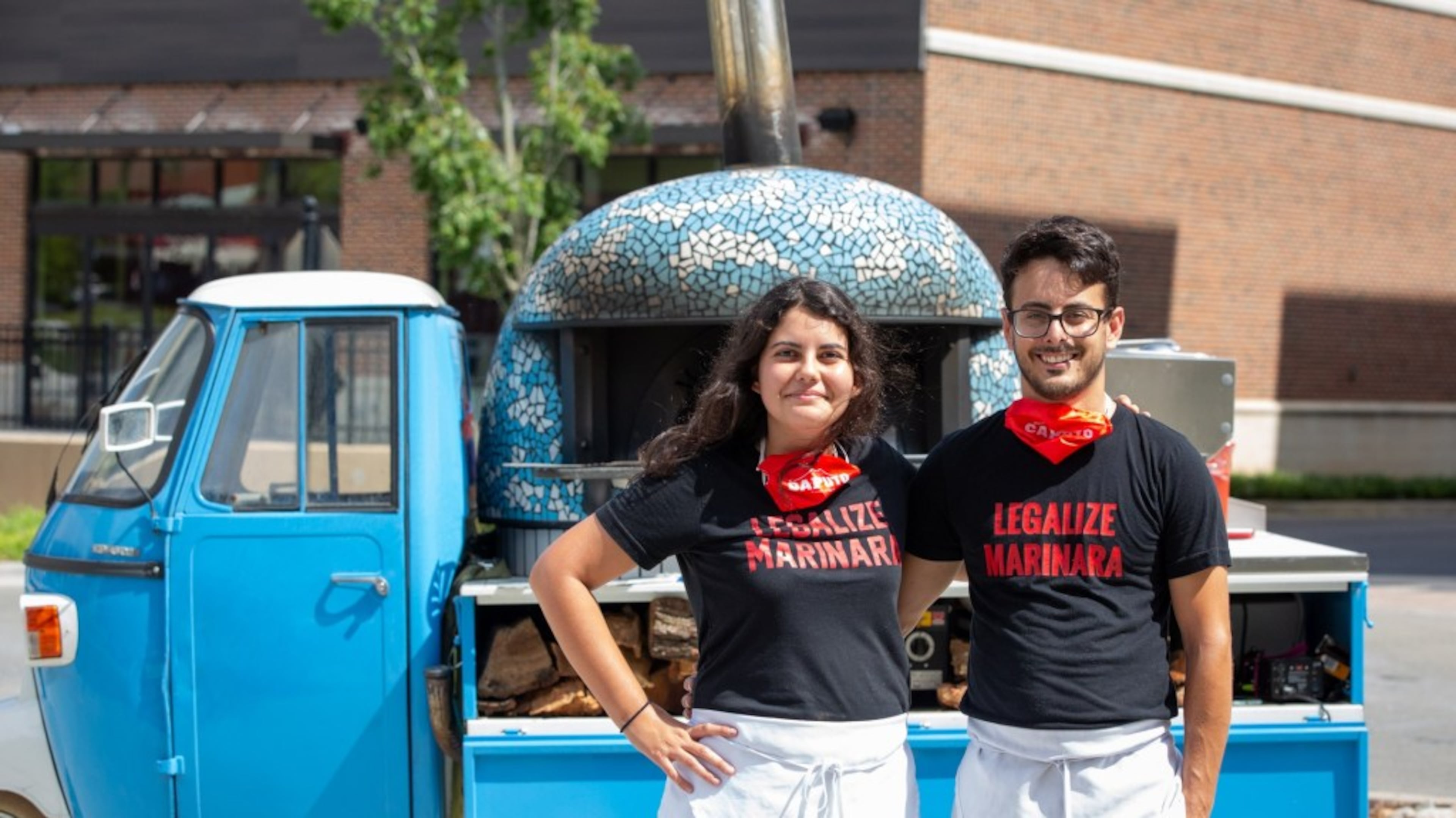 Atlanta Pizza Truck owners Sofia Arango and Alessio Lacco with their vintage ApeCar.