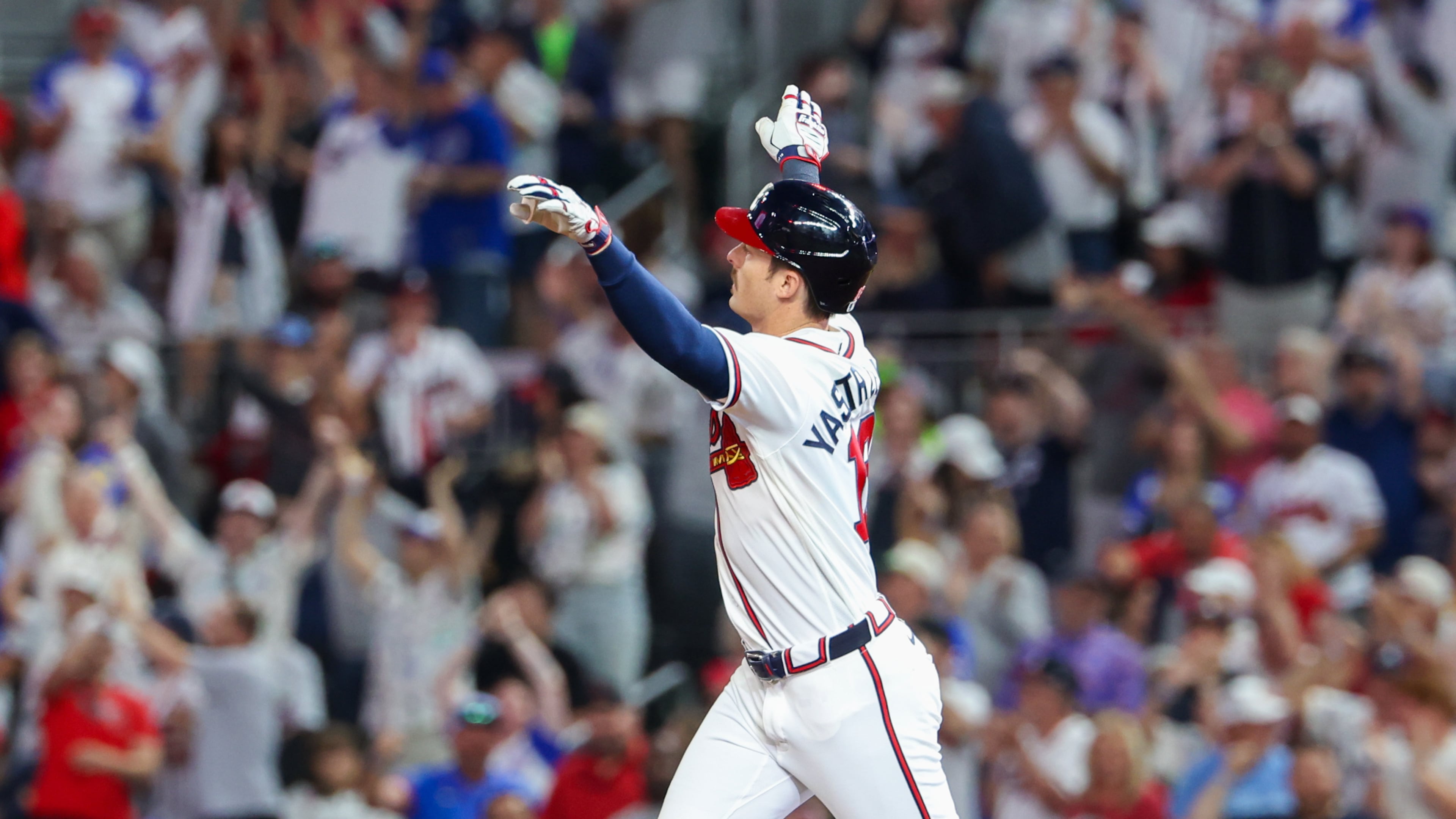 Atlanta Braves left fielder Mike Yastrzemski (18) runs after hitting a home run in the fifth inning of the Braves versus Cubs game at Truist Park in Atlanta on May 12, 2026. (Arvin Temkar/AJC)