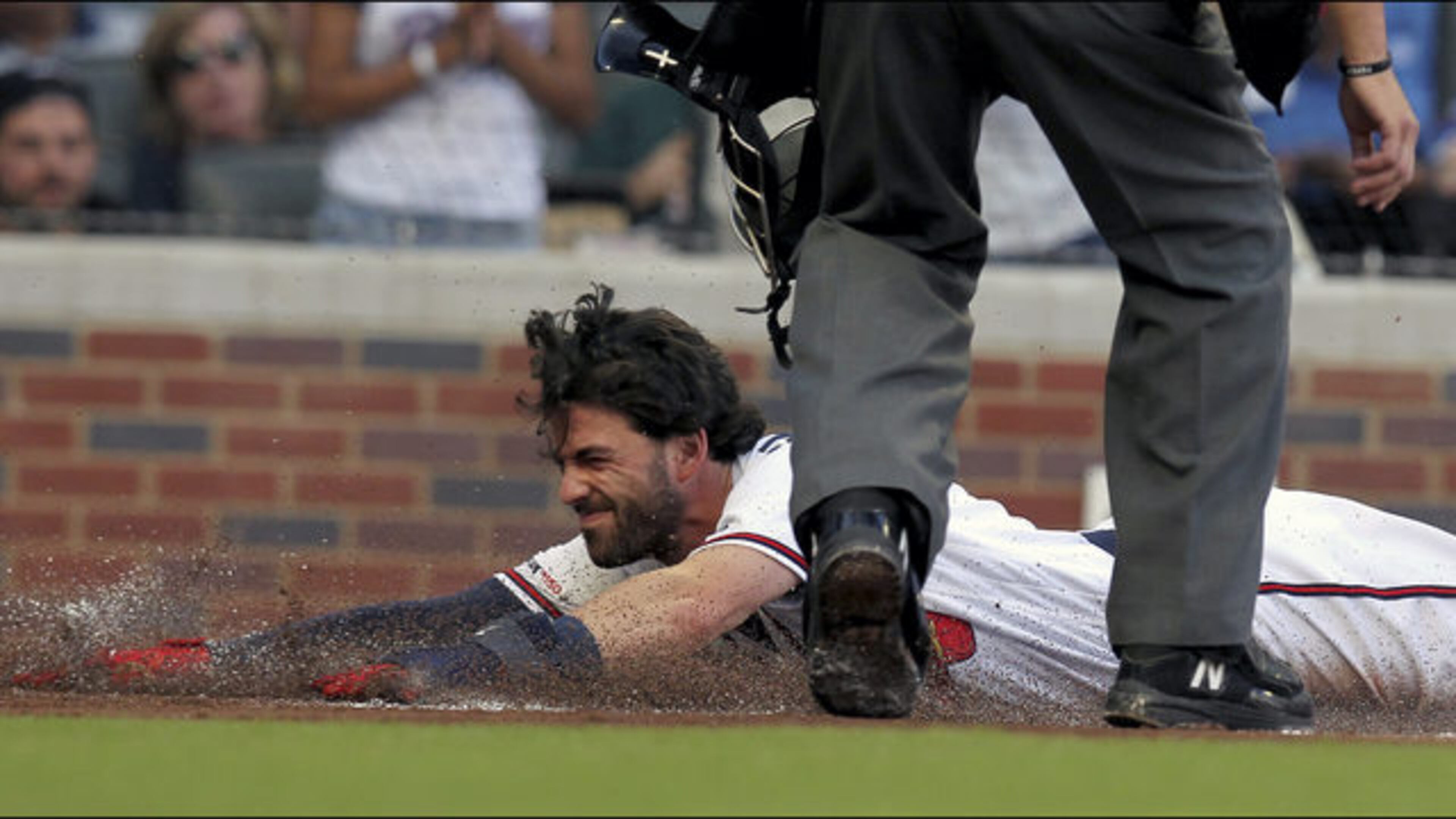 <p>
Atlanta Braves' Nick Markakis hits a two-run line drive single to right field during the first inning of a baseball game against the Washington Nationals, Sunday, July 21, 2019, in Atlanta. (AP Photo/John Amis)
</p> <p>
Atlanta Braves Dansby Swanson slides safely into home plate on a hit against the Kansas City Royals during the first inning of a baseball game Tuesday, July 23, 2019, in Atlanta. (AP Photo/Tami Chappell)
</p>