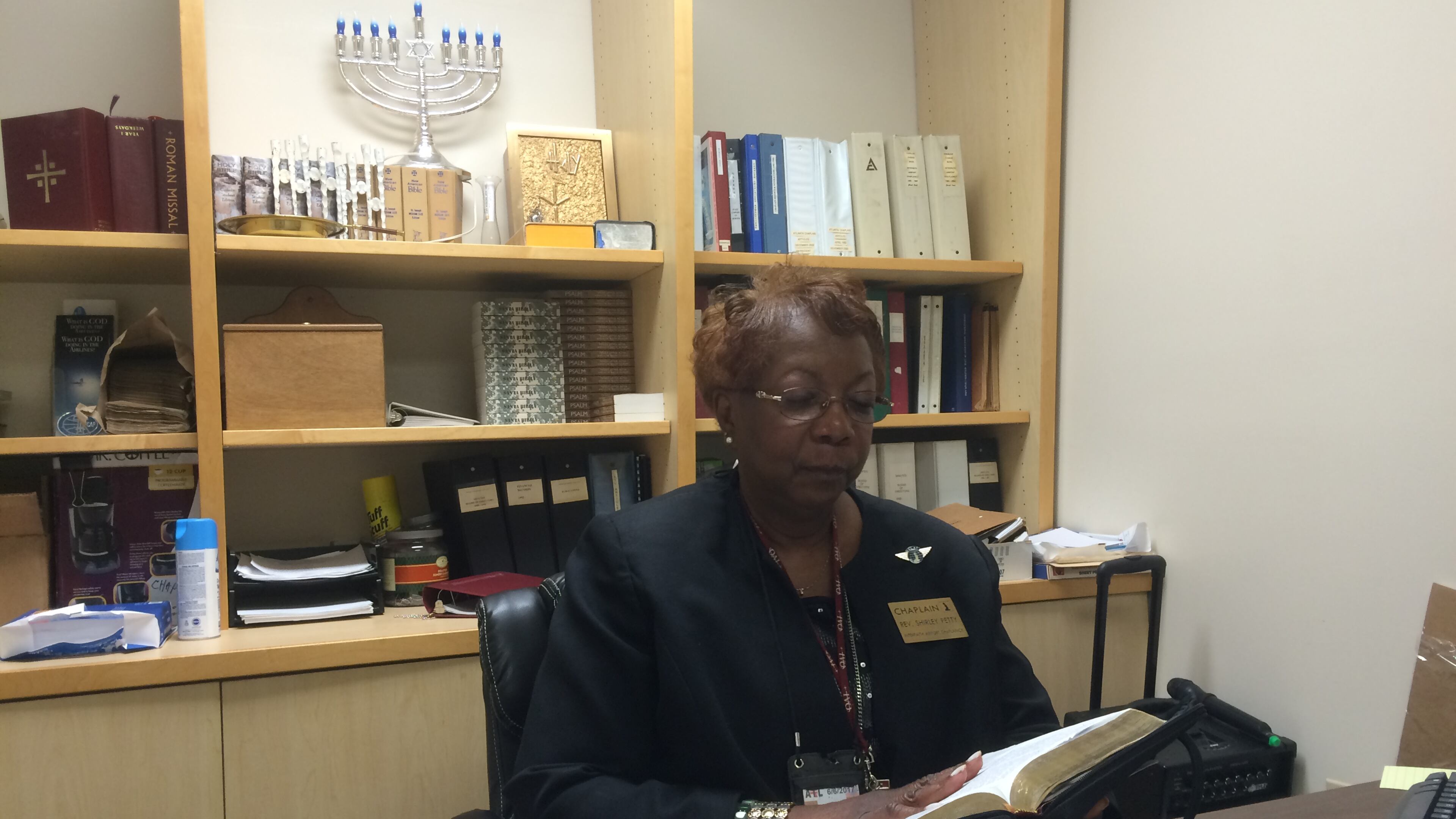 Rev. Shirley Petty offered words of solace to travelers after the worst mass shooting in U.S. history. Photo: Jennifer Brett