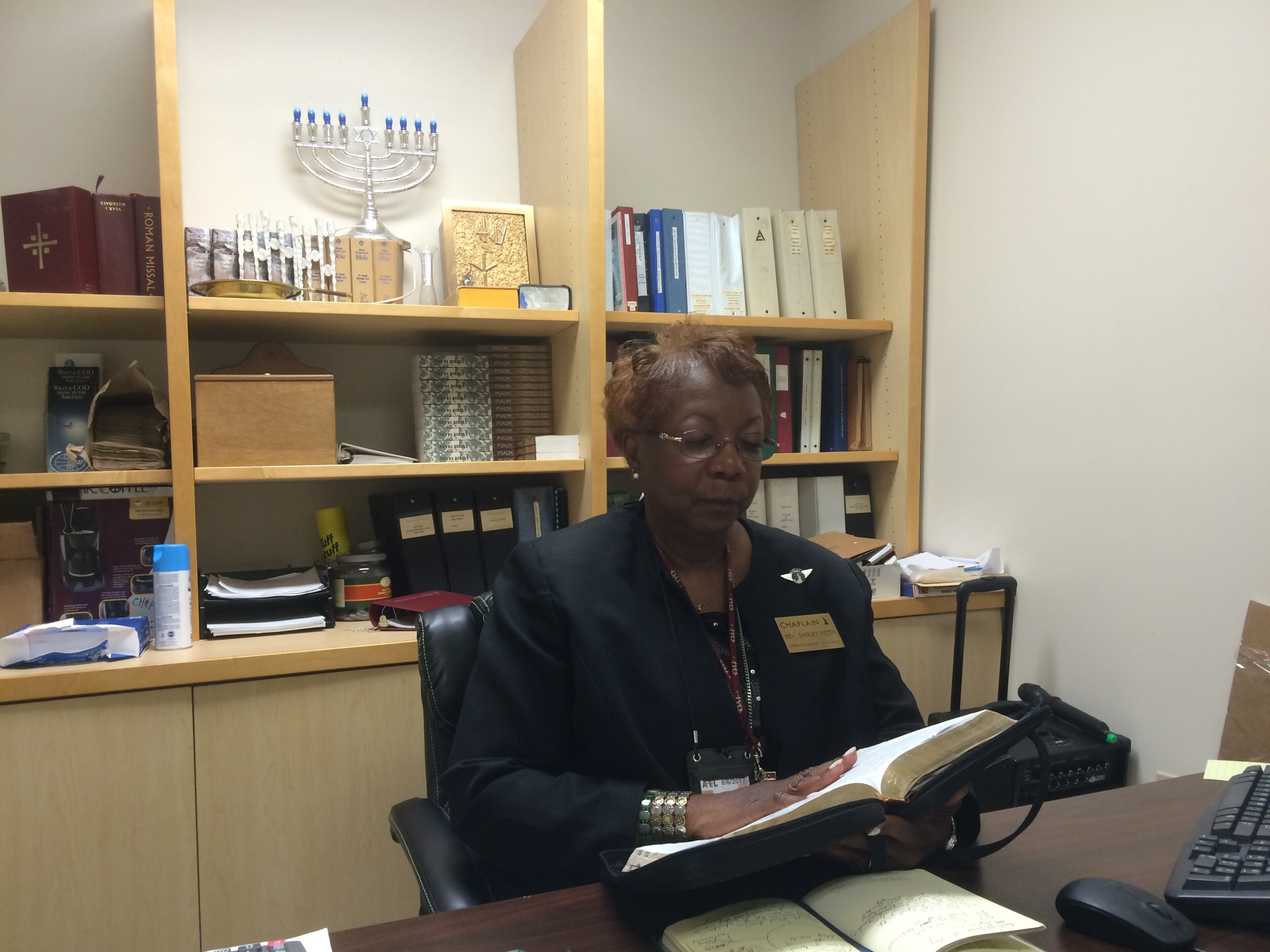 Rev. Shirley Petty offered words of solace to travelers after the worst mass shooting in U.S. history. Photo: Jennifer Brett