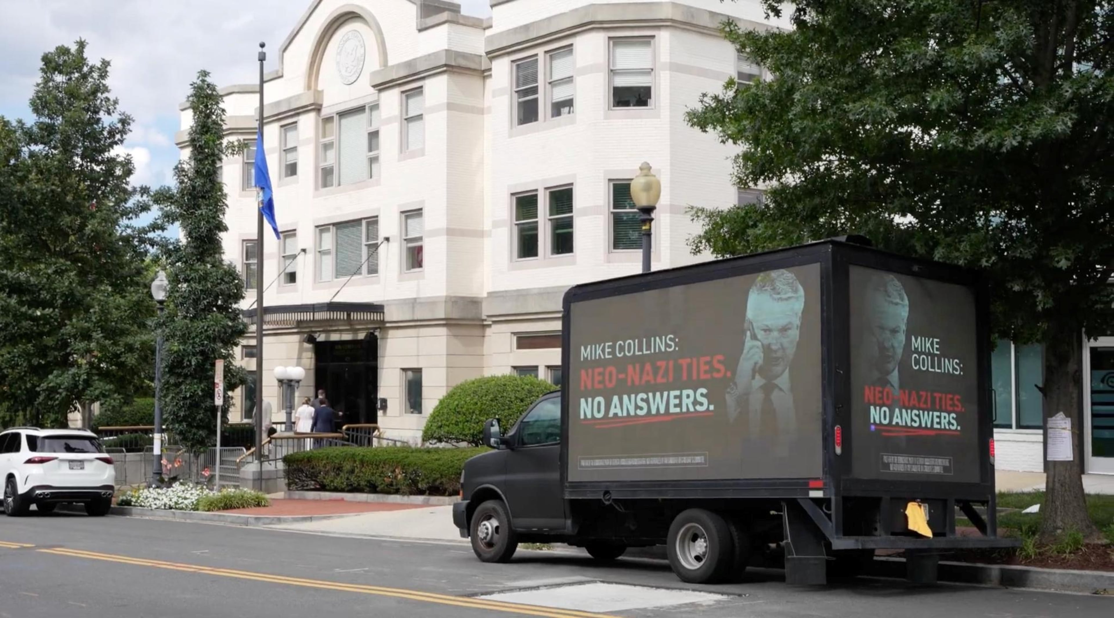 The Democratic Party of Georgia paid to park a mobile billboard outside of the site of a fundraiser for U.S. Senate candidate Mike Collins highlighting controversy surrounding his son-in-law. (Photo: Democratic Party of Georgia)