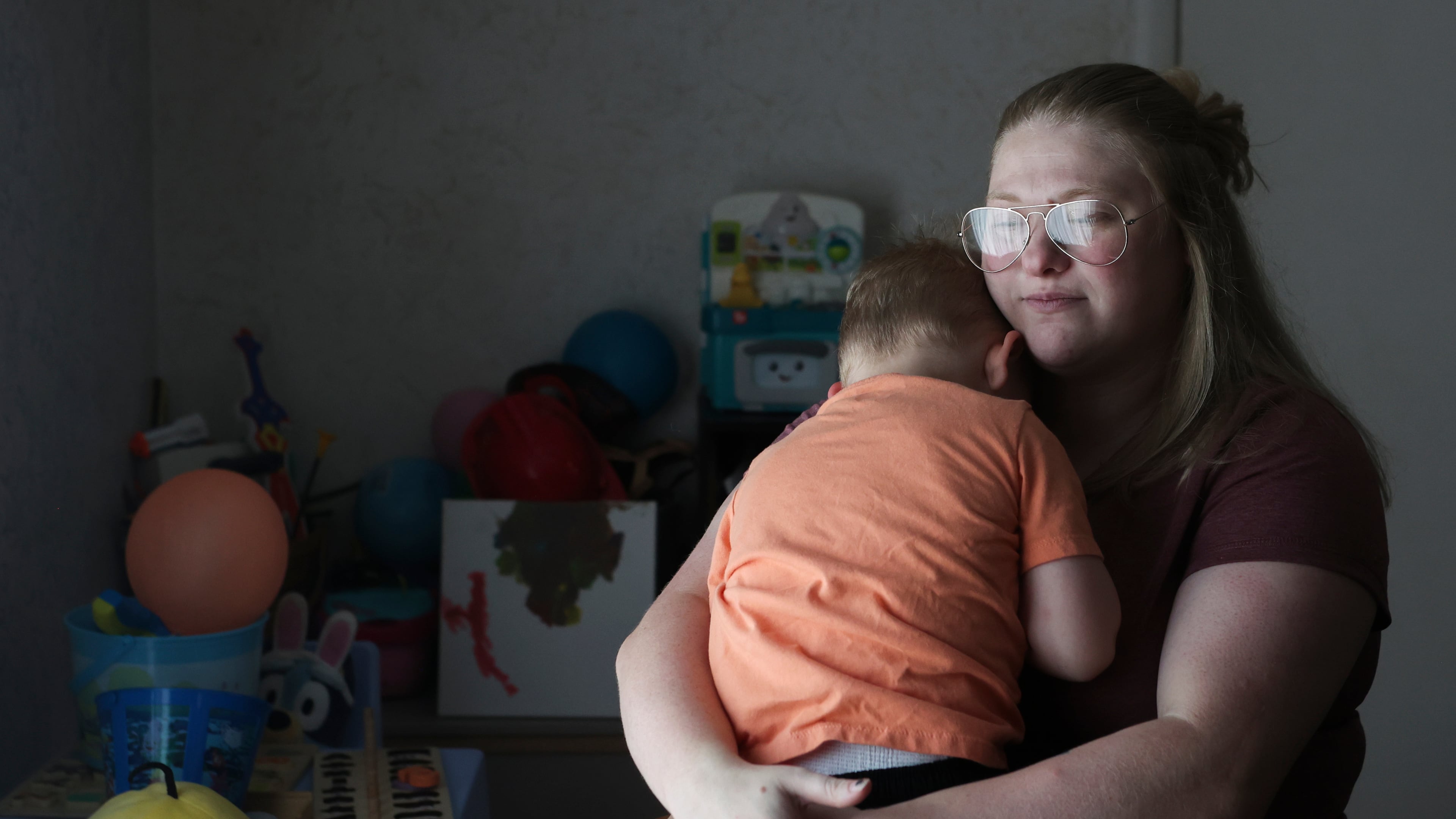 Meygan Maloney poses for a portrait with her son Callum Wilson, 3, Friday, Aug. 28, 2026, at their home in Hartford City, Ind. (AP Photo/Cara Penquite)