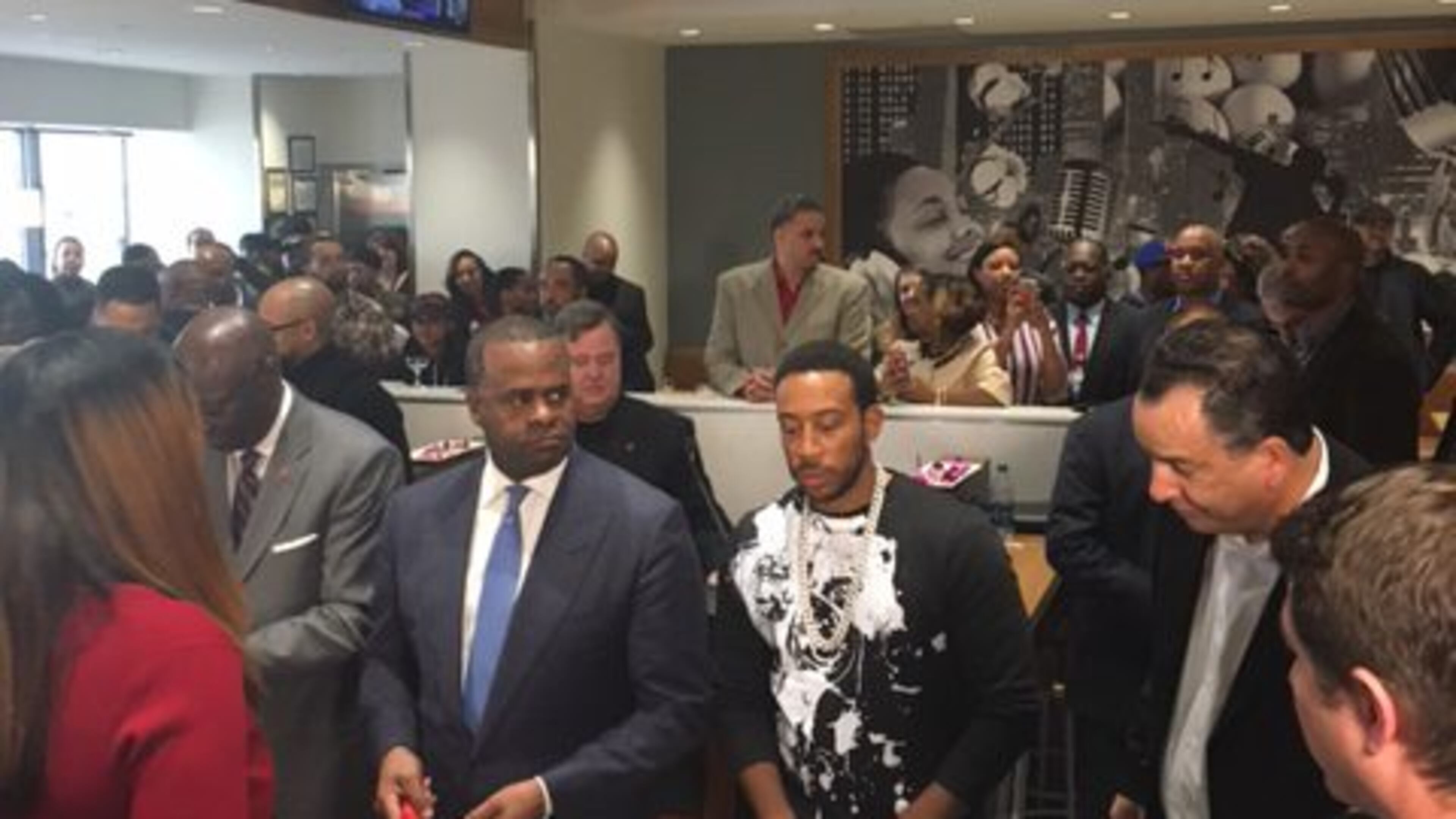 Mayor Kasim Reed (from left), Ludacris and Jackmont Hospitality CEO Jerry Halpern at the ribbon cutting for Chicken + Beer Dec. 12, 2016.