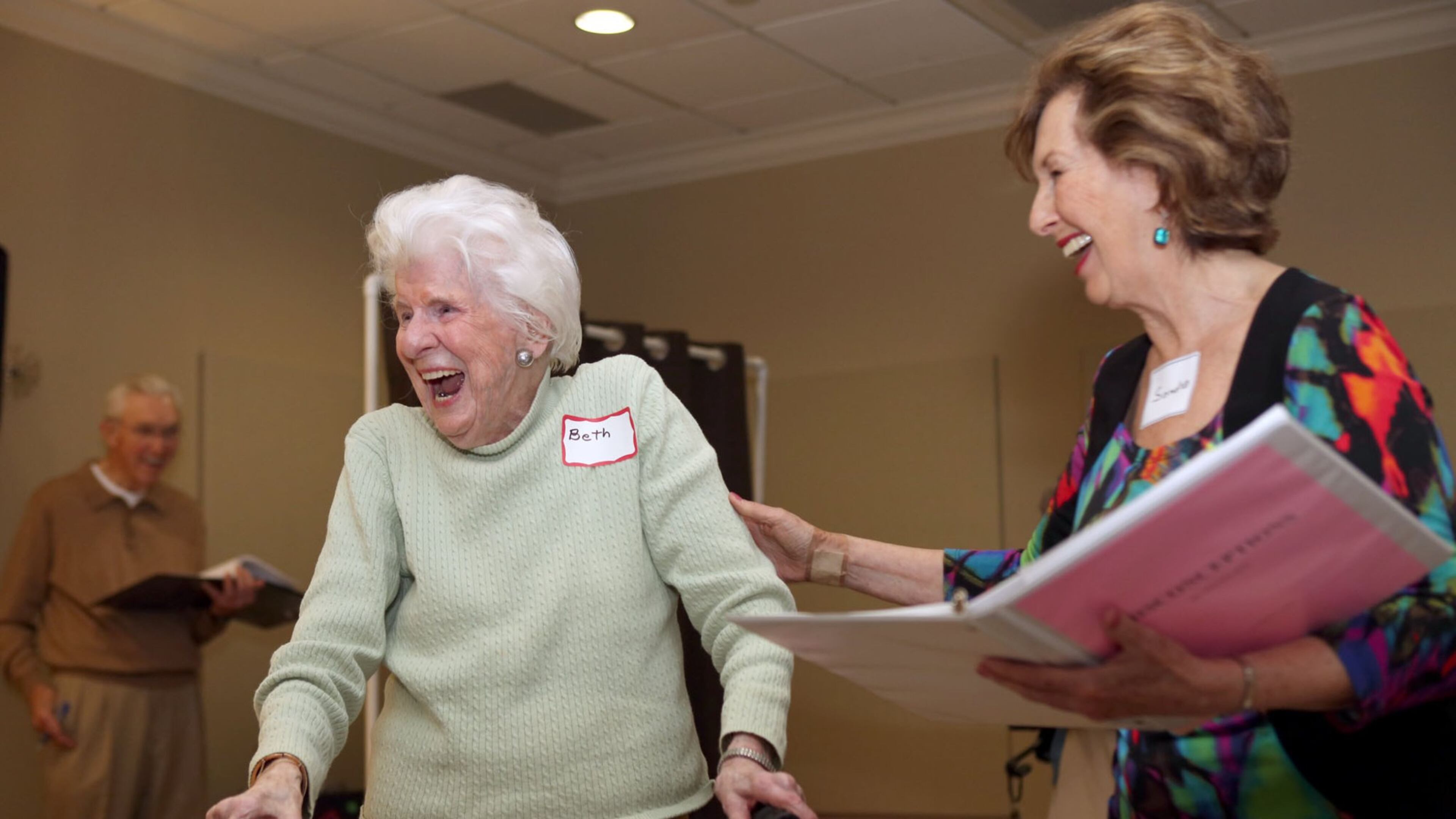 Tina Perrot, who plays Beth, left, reacts to a humorous moment with director Sondra Ilgenfritz with Ralph Sacks in back. (Akili-Casundria Ramsess/Special to the AJC)