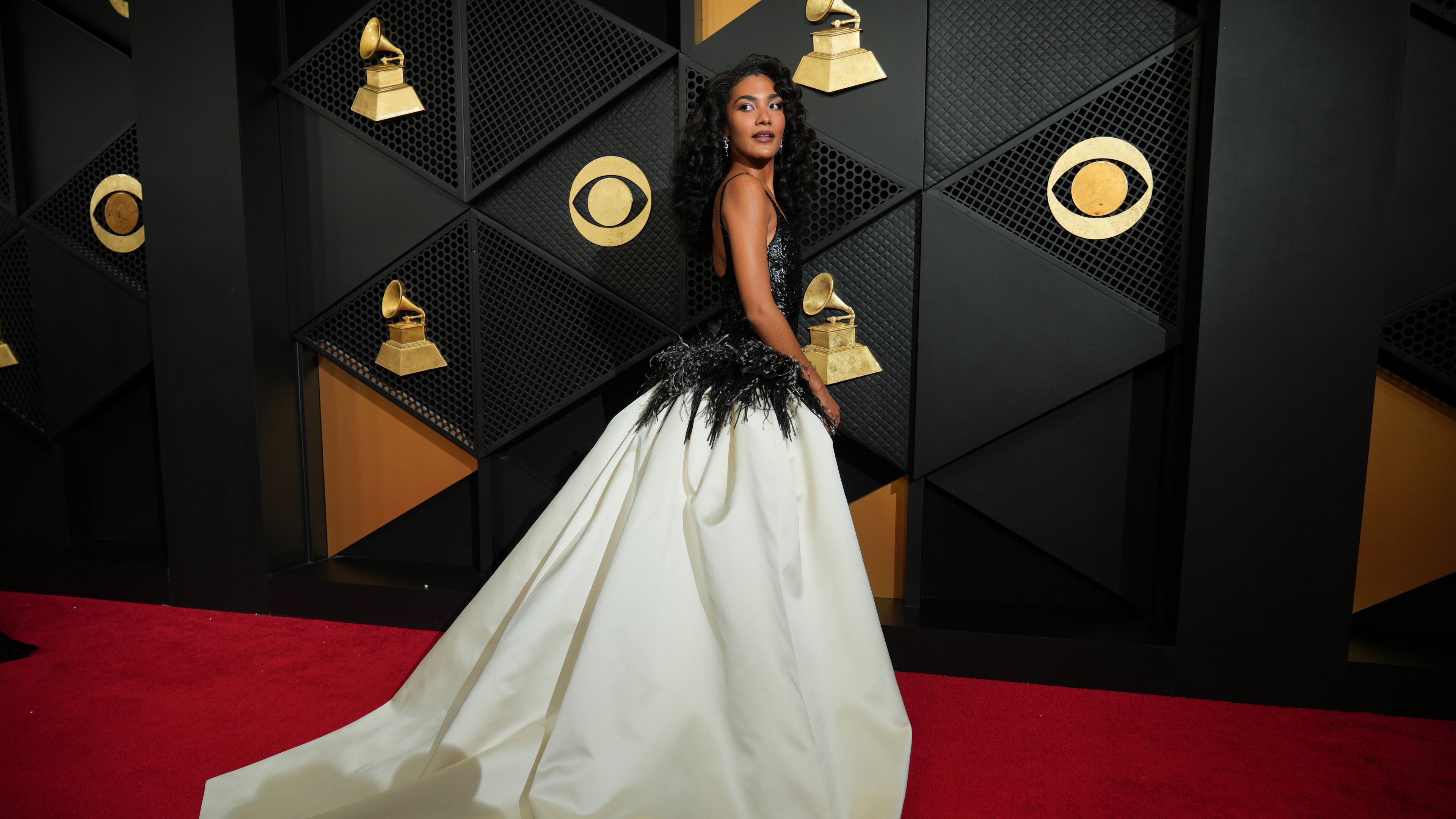 Olivia Dean arrives at the 68th annual Grammy Awards on Sunday, Feb. 1, 2026, in Los Angeles. (Photo by Jordan Strauss/Invision/AP)