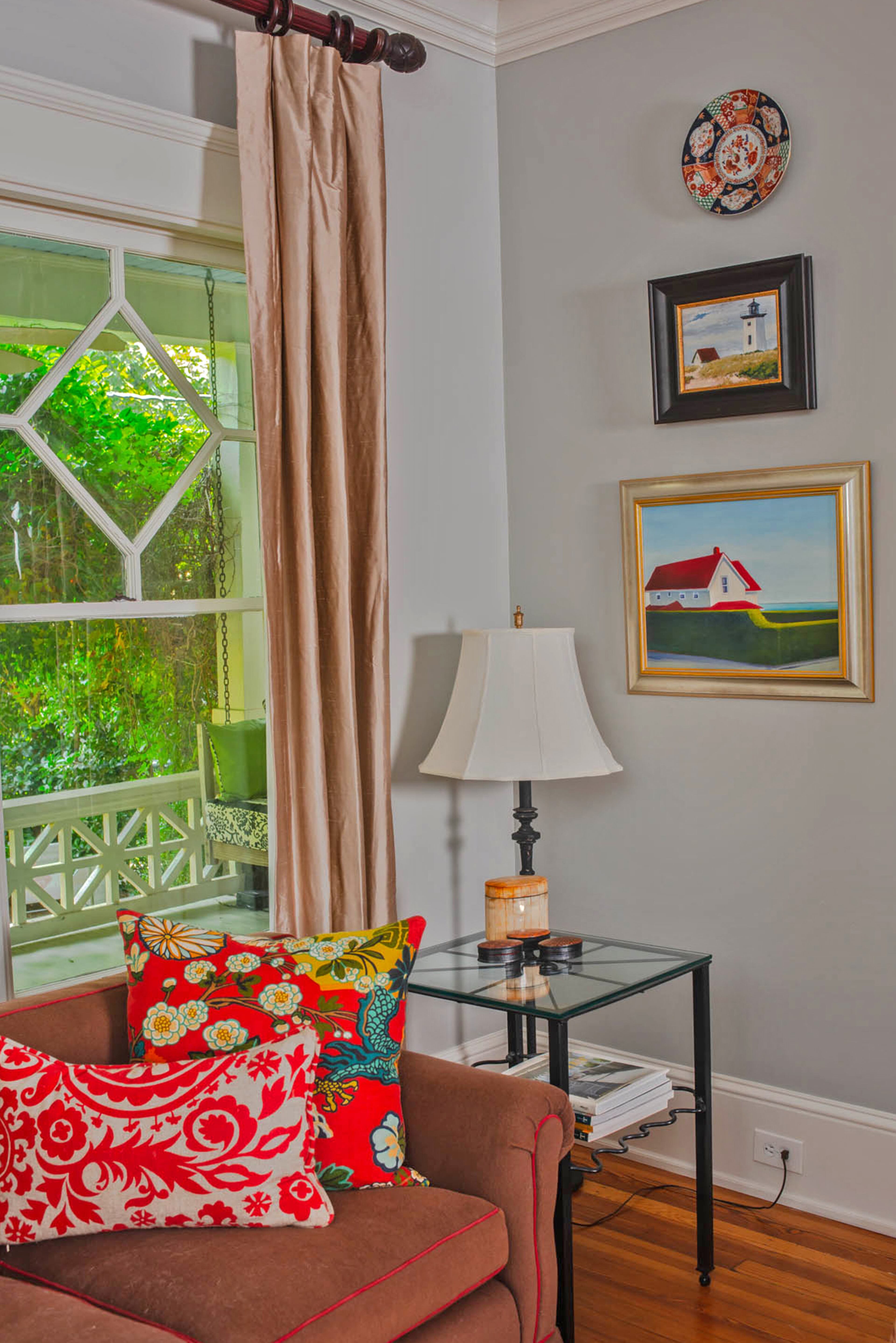 The homeowners are drawn to the water, as seen in the paintings and artwork throughout their home.