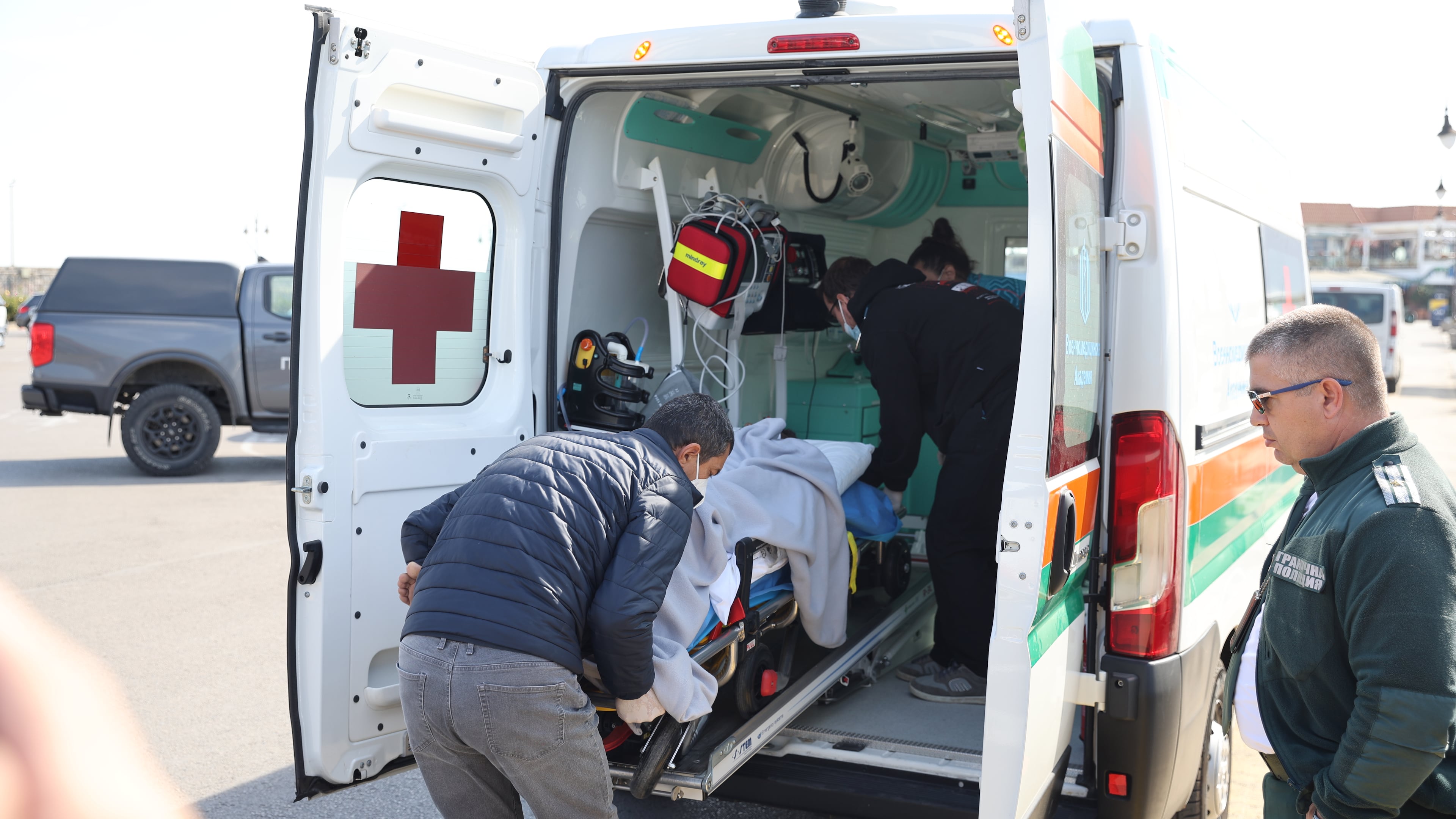 Bulgarian authorities take an injured crew member to a hospital after two commercial vessels were attacked in the NATO member's Black Sea economic zone on Tuesday, Oct. 6, 2026, Varna, in what was the first such attack on shipping in the area. (Bulgarian News Agency via AP)