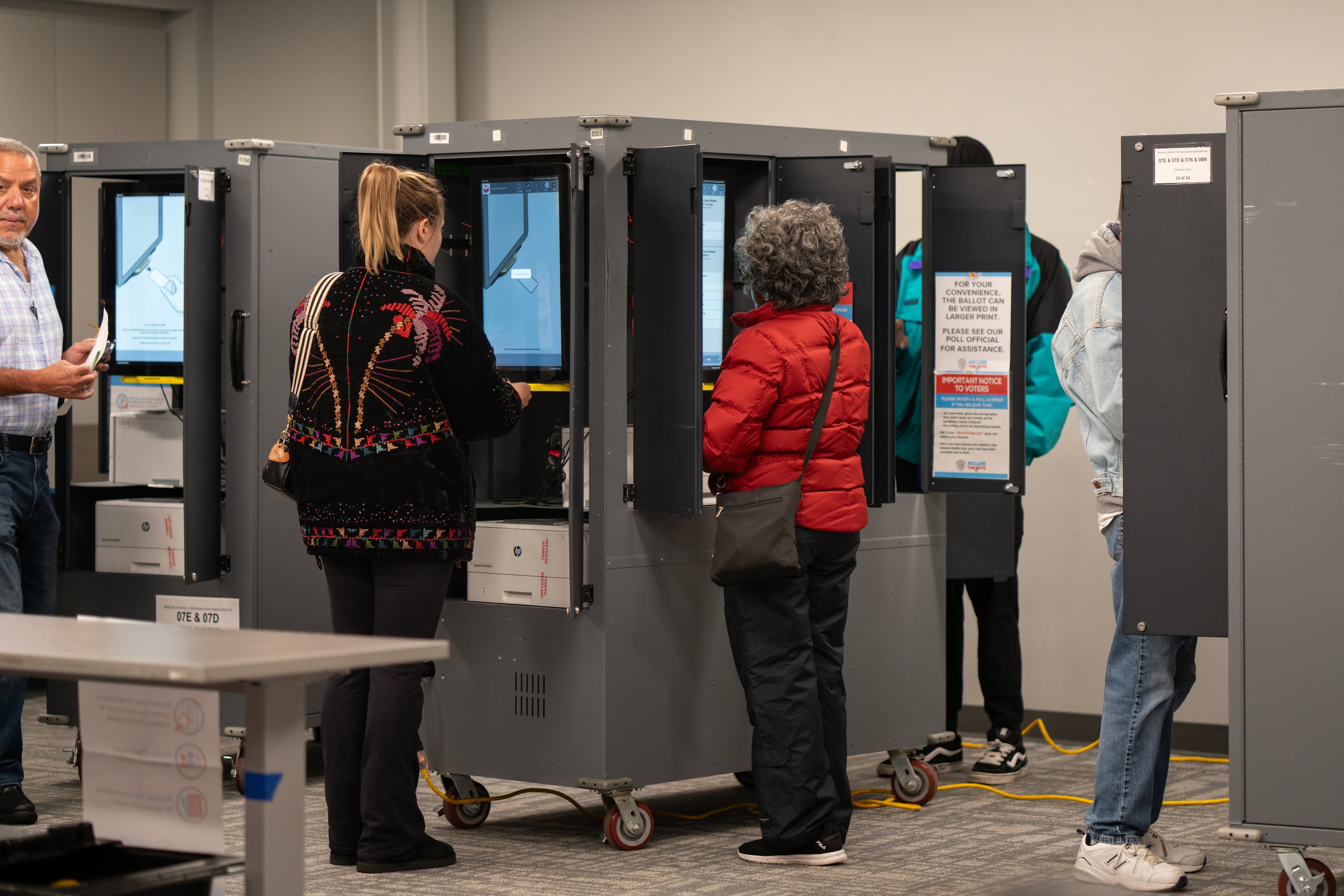 Voters cast their ballots inside the Buckhead Library voting precinct. Monday, November 4, 2025 (Ben Hendren for the AJC)