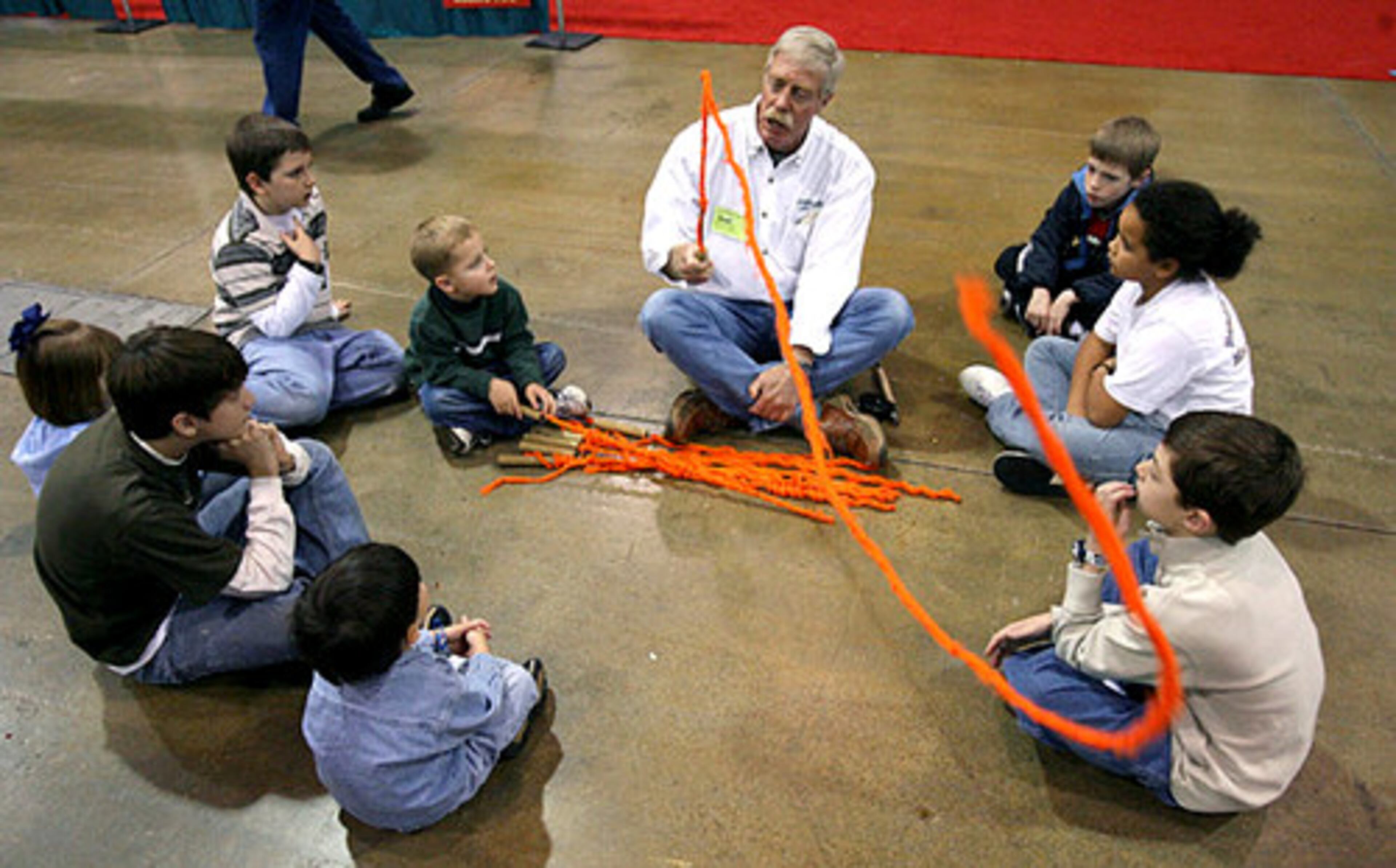 Rick Ruoff demonstrates a fly fishing cast during kids casting at the Atlanta Fly Fishing Festival at the Gwinnett Center Saturday morning in Duluth. This was one of two sessions that Ruoff put on during the day.