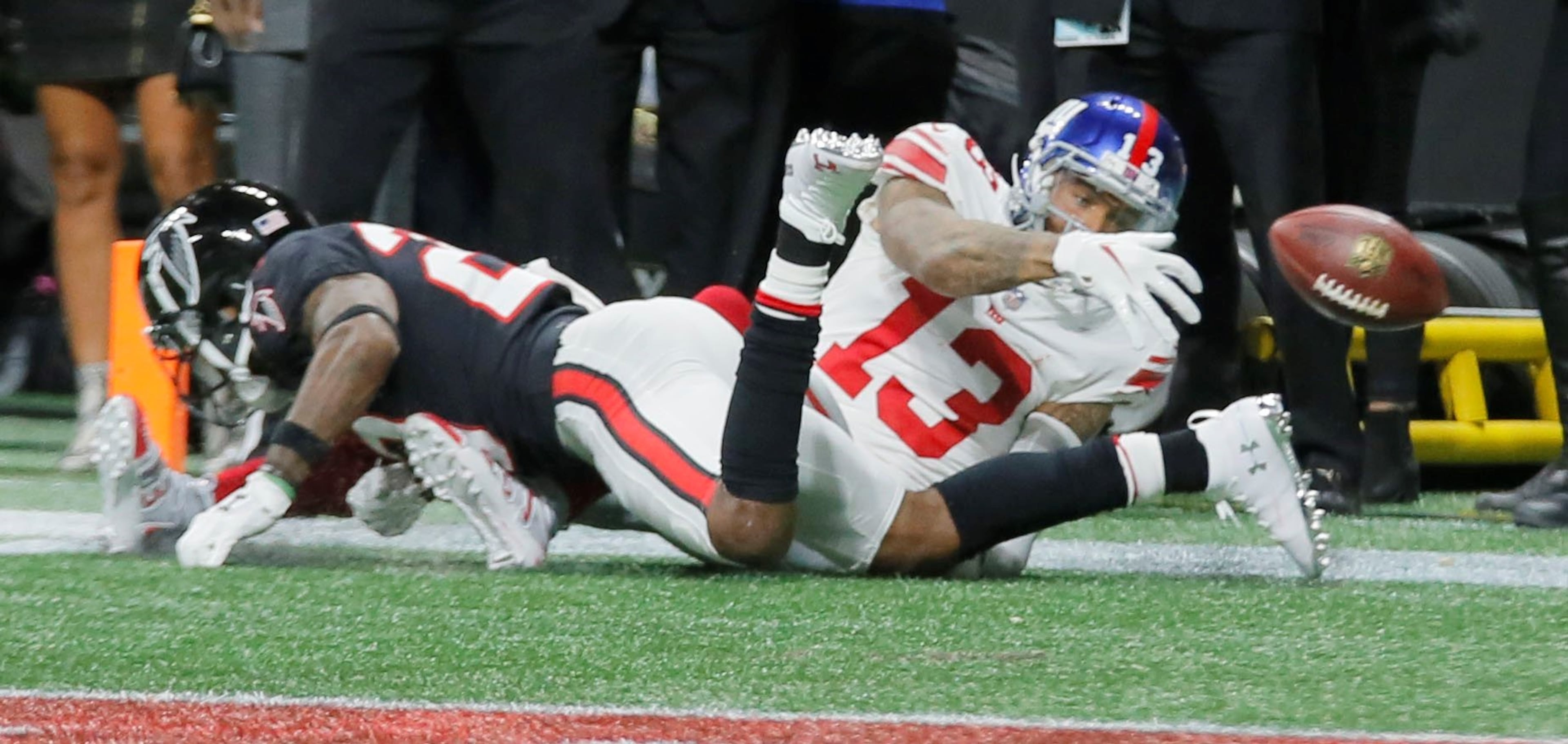 10/22/18 - Atlanta - New York Giants wide receiver Odell Beckham (13) can't handle this end zone pass from New York Giants quarterback Eli Manning (10) that was defended by Atlanta Falcons cornerback Robert Alford (23). The Atlanta Falcons played the New York Giants in an NFL football game Monday, October 22, 2018, at Mercedes-Benz Stadium in Atlanta, GA. BOB ANDRES / BANDRES@AJC.COM