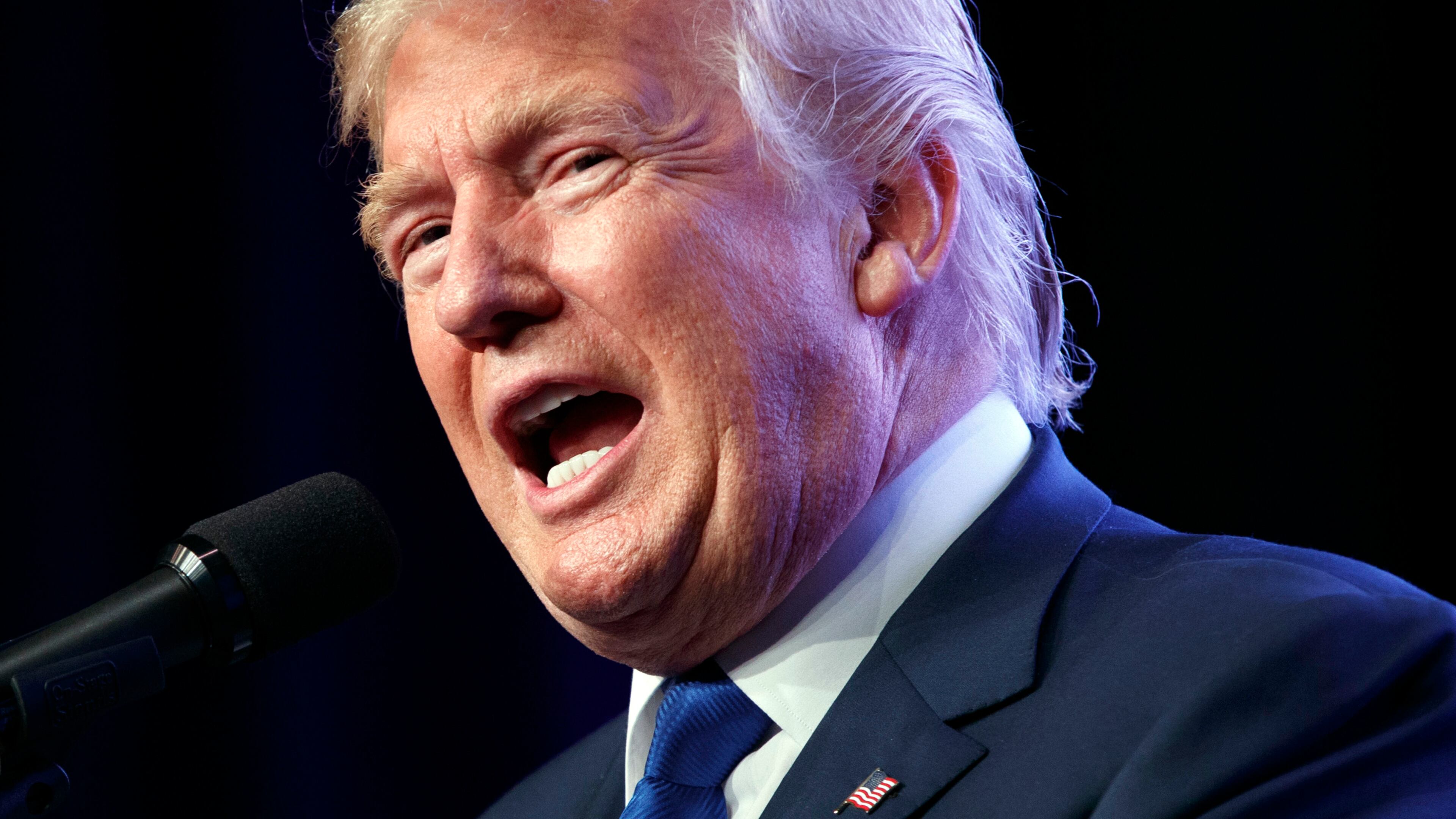 FILE - In this Sept. 16, 2016 file photo, Republican presidential candidate Donald Trump speaks during a campaign rally in Miami. The 2016 campaign for president reaches what may be a decisive milestone: the first debate between Hillary Clinton and Donald Trump. This is an analytical reader that should largely stand until mid-afternoon, with updates on merits in the event of breaking news. (AP Photo/ Evan Vucci, File)