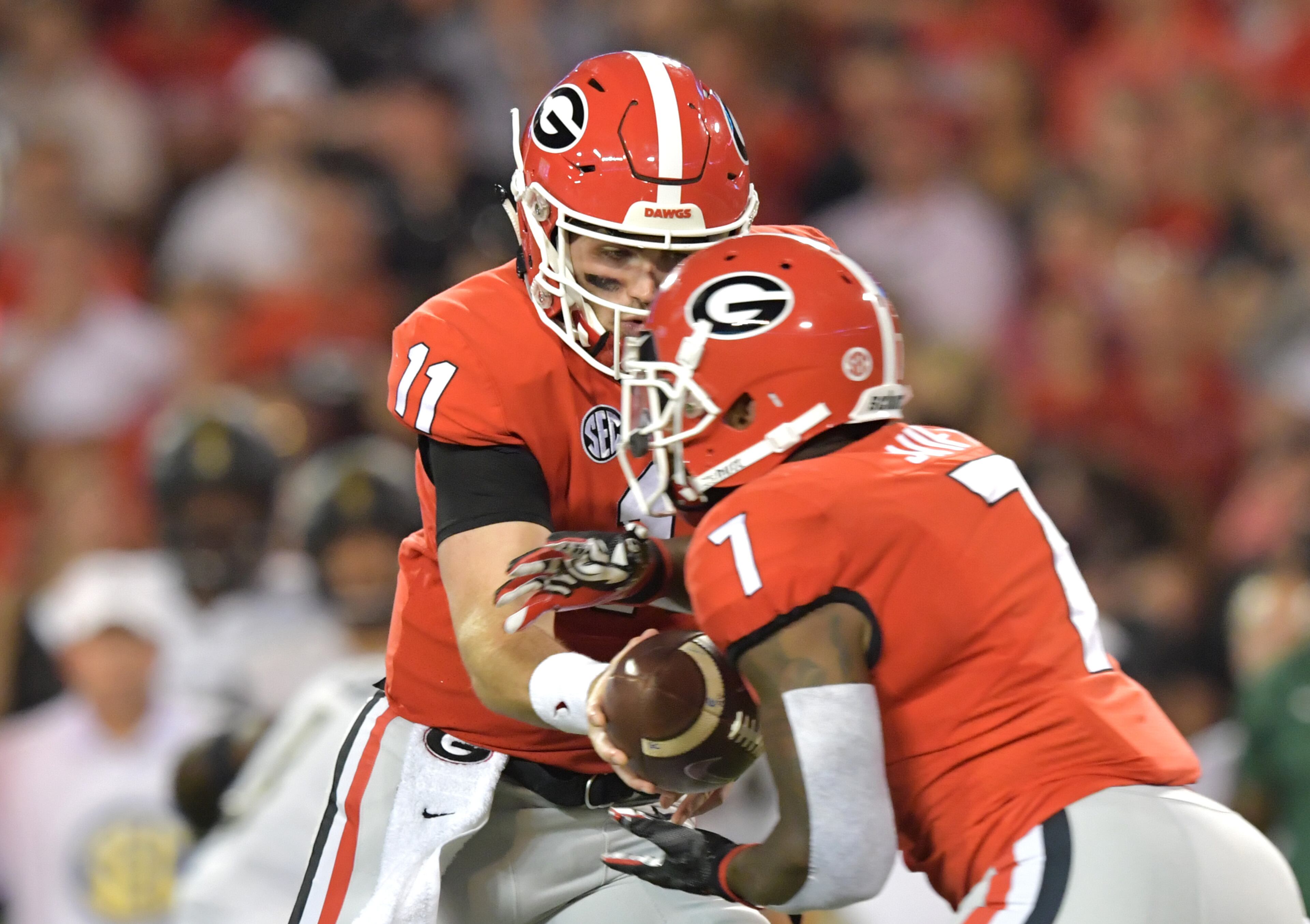 October 6, 2018 Athens - Georgia quarterback Jake Fromm (11) gets off a pass to Georgia running back D'Andre Swift (7) in the first half during a NCAA college football game at Sanford Stadium in Athens on Saturday, October 6, 2018. HYOSUB SHIN / HSHIN@AJC.COM