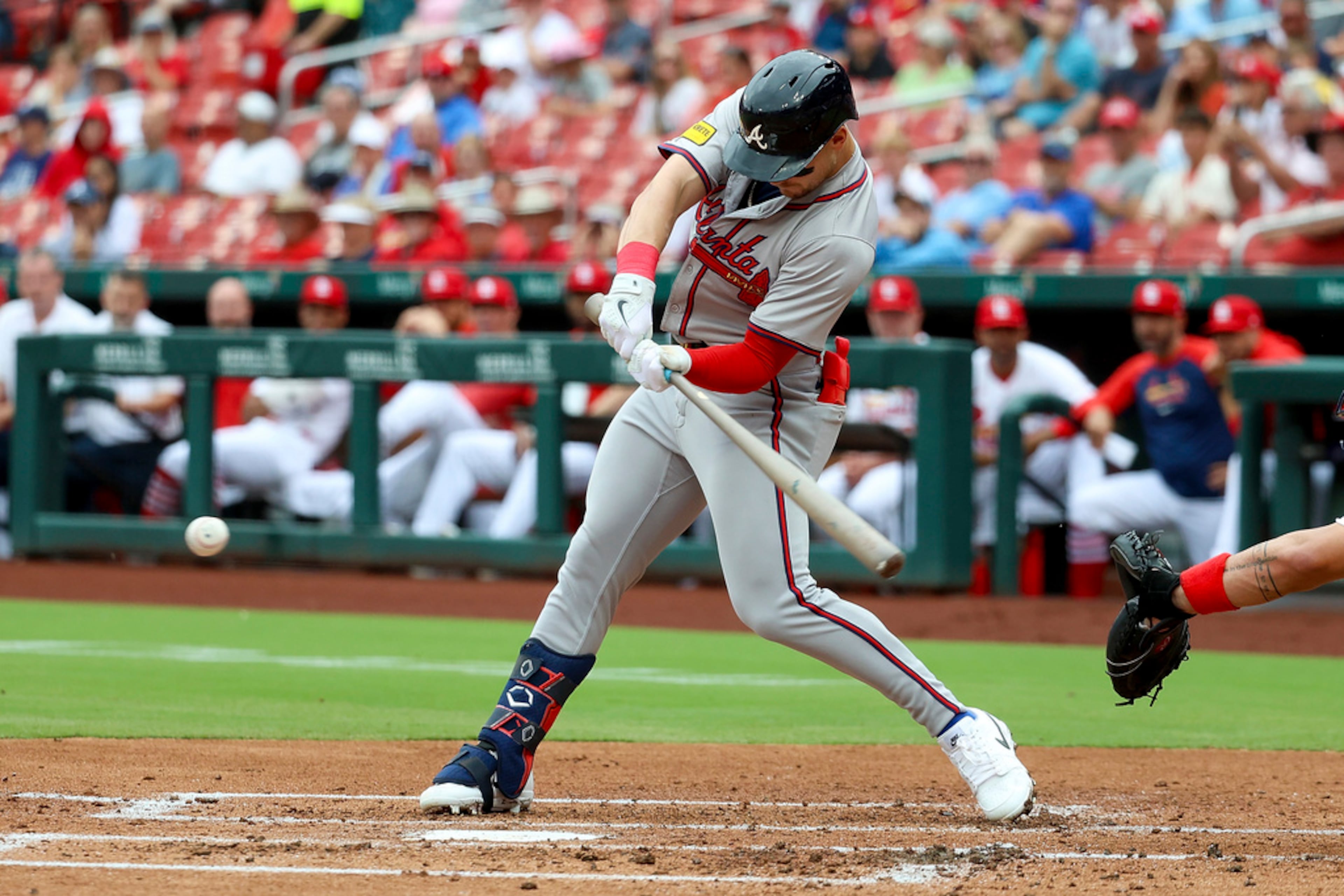 Atlanta Braves' Jarred Kelenic hits an RBI single during the second inning in the first game of a baseball doubleheader against the St. Louis Cardinals Wednesday, June 26, 2024, in St. Louis. (AP Photo/Scott Kane)