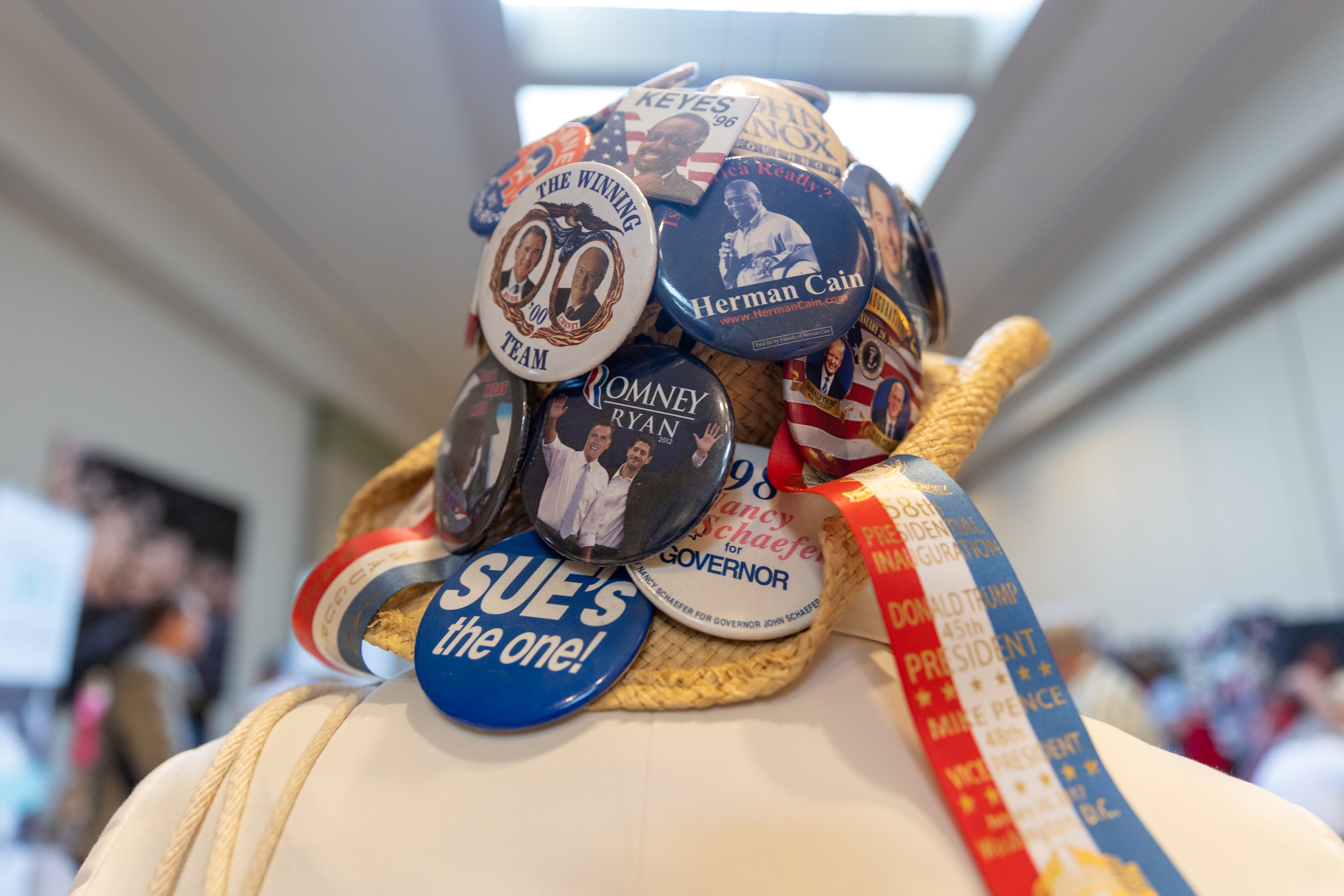 Convention-goers sporting political buttons are seen at the Georgia GOP convention at Jekyll Island on Saturday, June 5, 2021. (Photo: Nathan Posner for The Atlanta-Journal-Constitution)