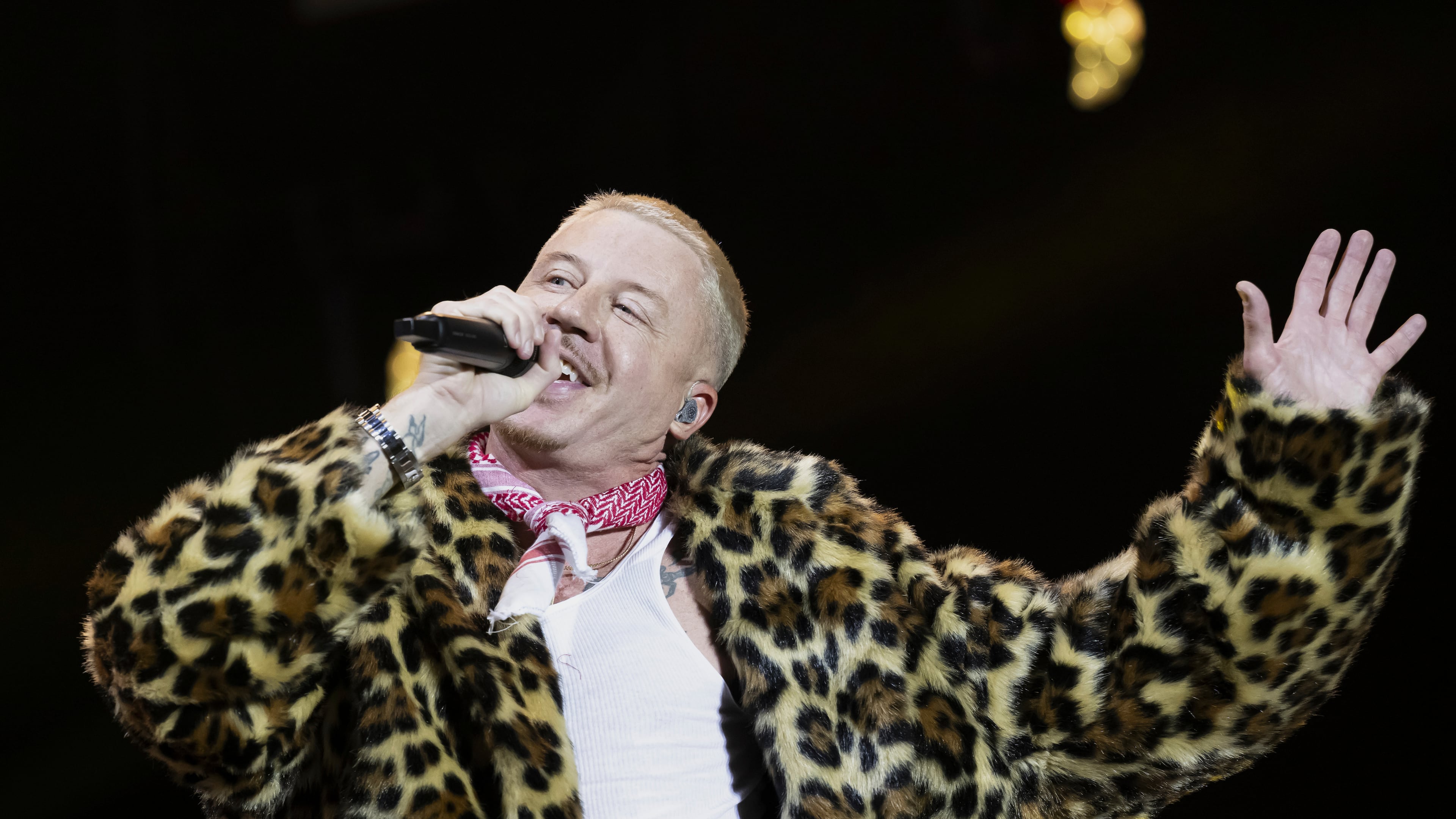 FILE - U.S. rapper Macklemore performs on the Main Stage at the 42th Gurtenfestival edition in Bern, Switzerland, Wednesday, July 16, 2025. (Anthony Anex/Keystone via AP, File)
