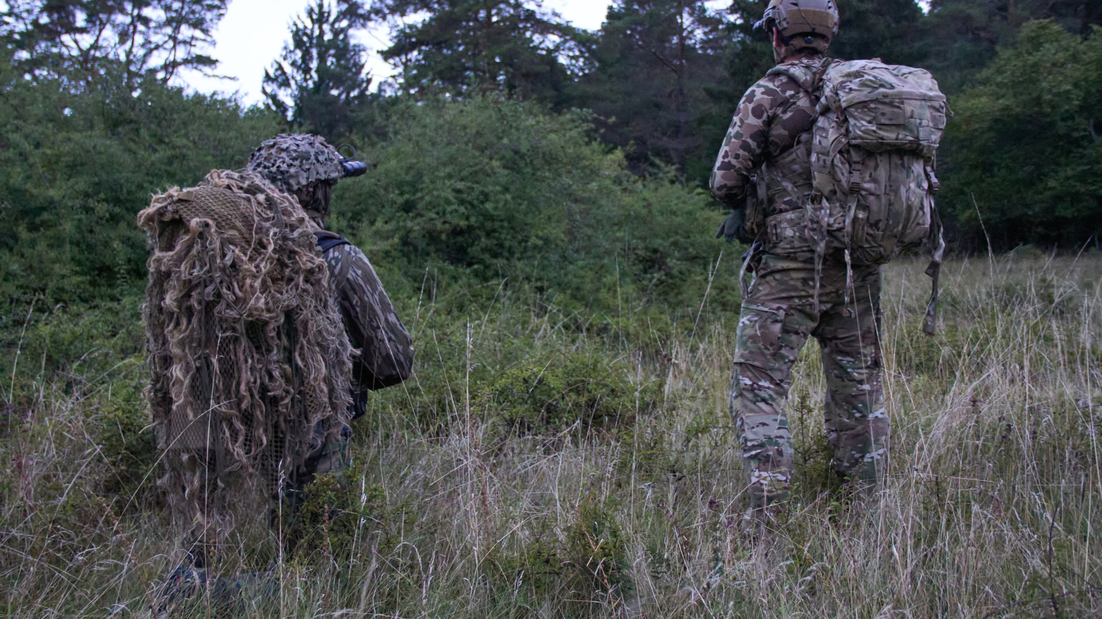 US special forces patrol during a joint military exercise with forces from Poland at the Joint Multinational Readiness Center in Hohenfels near Nuernberg, Germany, Friday, Aug. 28, 2026. (AP Photo/Konstantin Toropin)