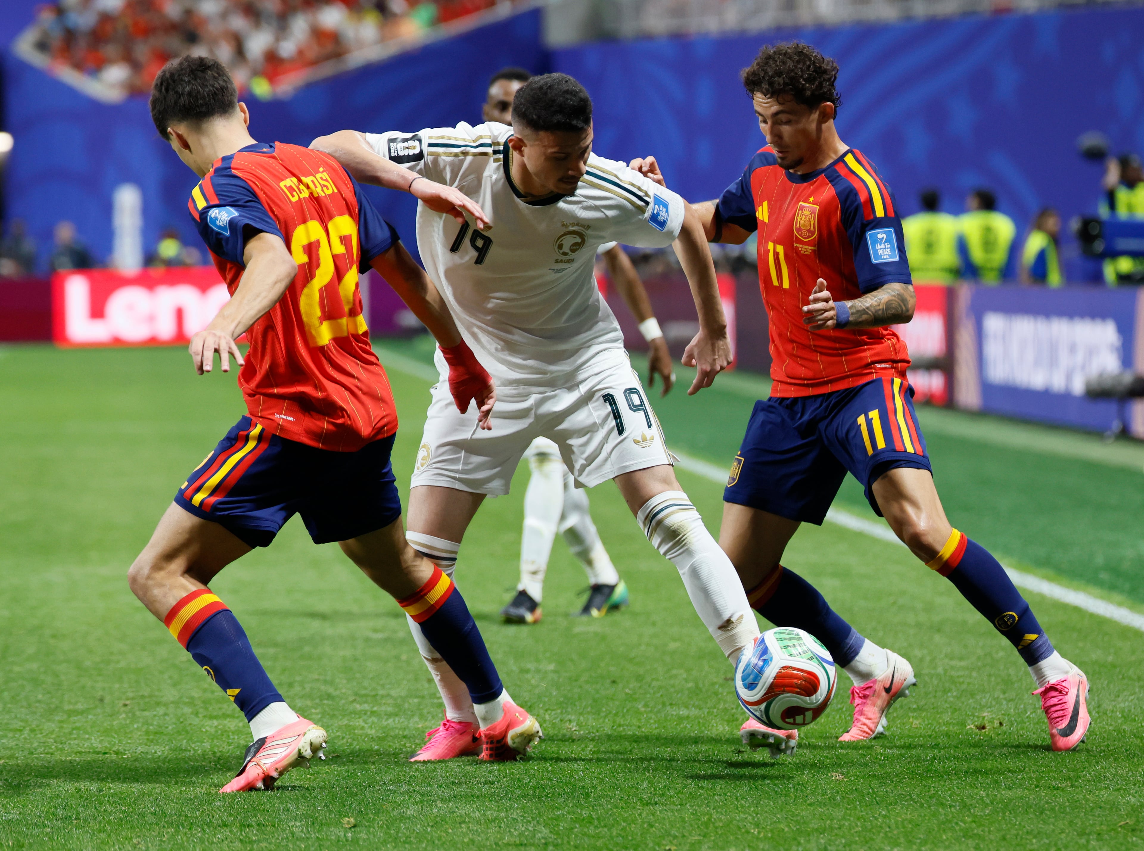 Saudi Arabia's Abdullah Al-Hamdan (center) battles Spain's Pau Cubarsi (left) and Yeremy Pino for the ball during the second half of the Spain vs. Saudi Arabia World Cup match Sunday, June 21, 2026, at Atlanta Stadium. (Miguel Martinez/AJC)