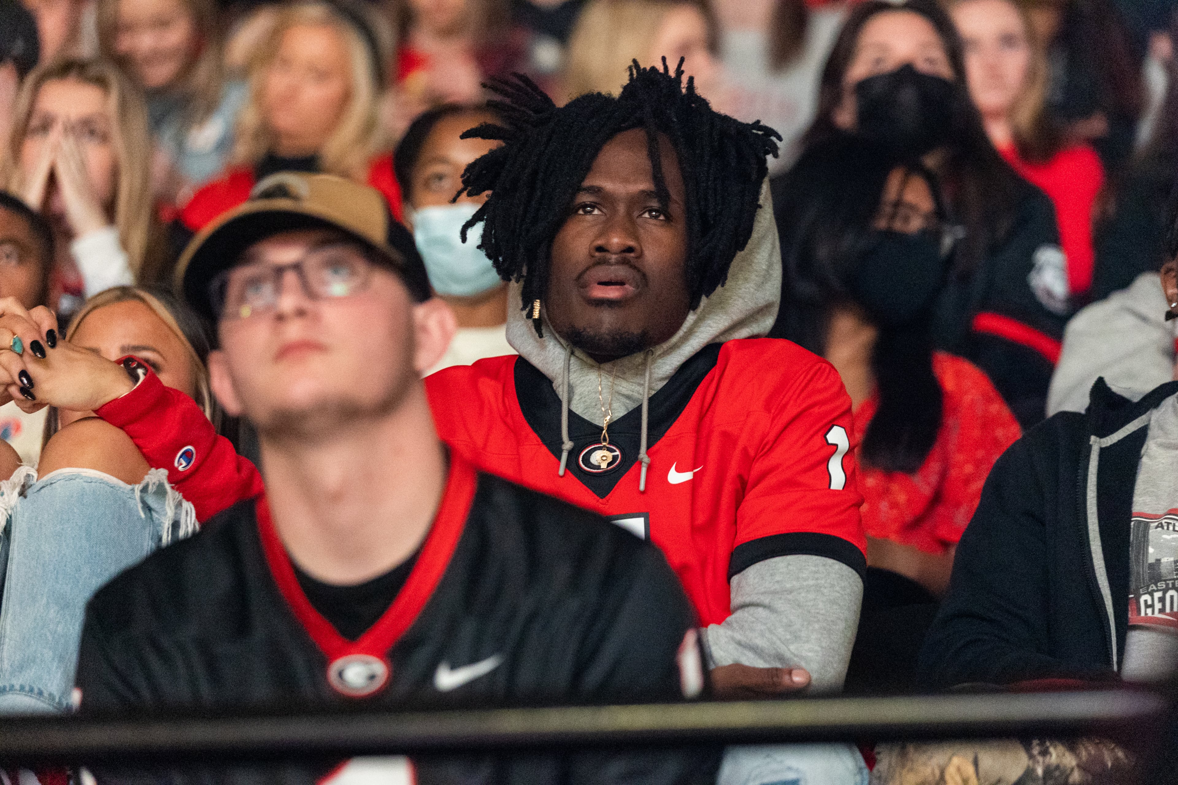 Georgia Bulldogs fans react during the second quarter of the College Football Playoff national championship game at a watch party at Stegeman Coliseum on the University of Georgia campus on Monday, January 10, 2022. (Photo: Nathan Posner for The Atlanta Journal-Constitution)