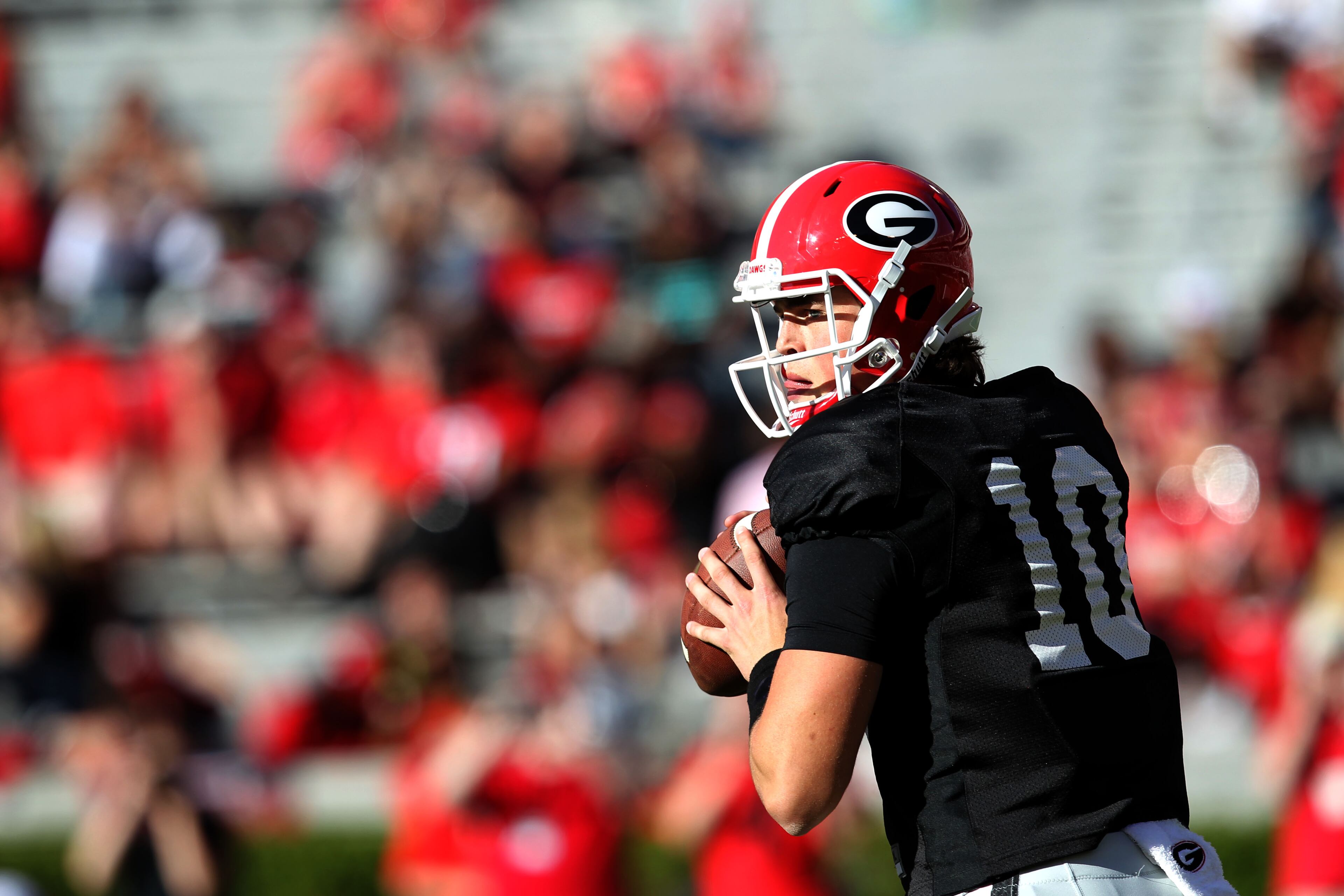 April 16, 2016 Athens - Georgia quarterback Jacob Eason (10) looks for an open teammate during the 2016 Georgia Bulldogs G-Day game at Sanford Stadium. TAYLOR CARPENTER / TAYLOR.CARPENTER@AJC.COM